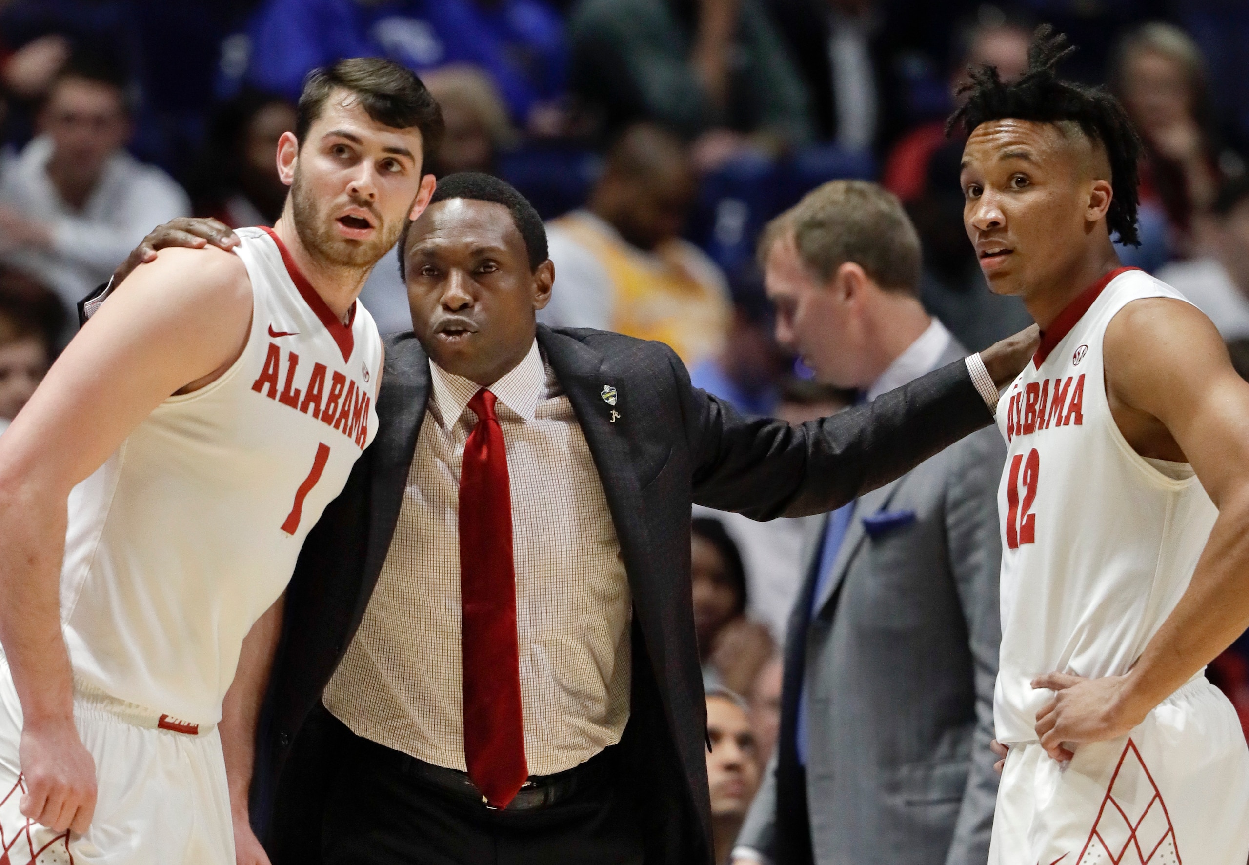 Riley Norris (1), Dazon Ingram (12) and Avery Johnson