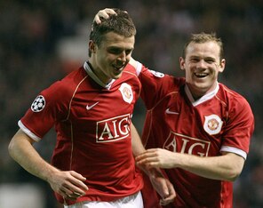 Wayne Rooney and Michael Carrick celebrate an amazing night for United fans.