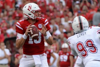 Tanner Lee threw two touchdowns, but he threw them both to the wrong team.