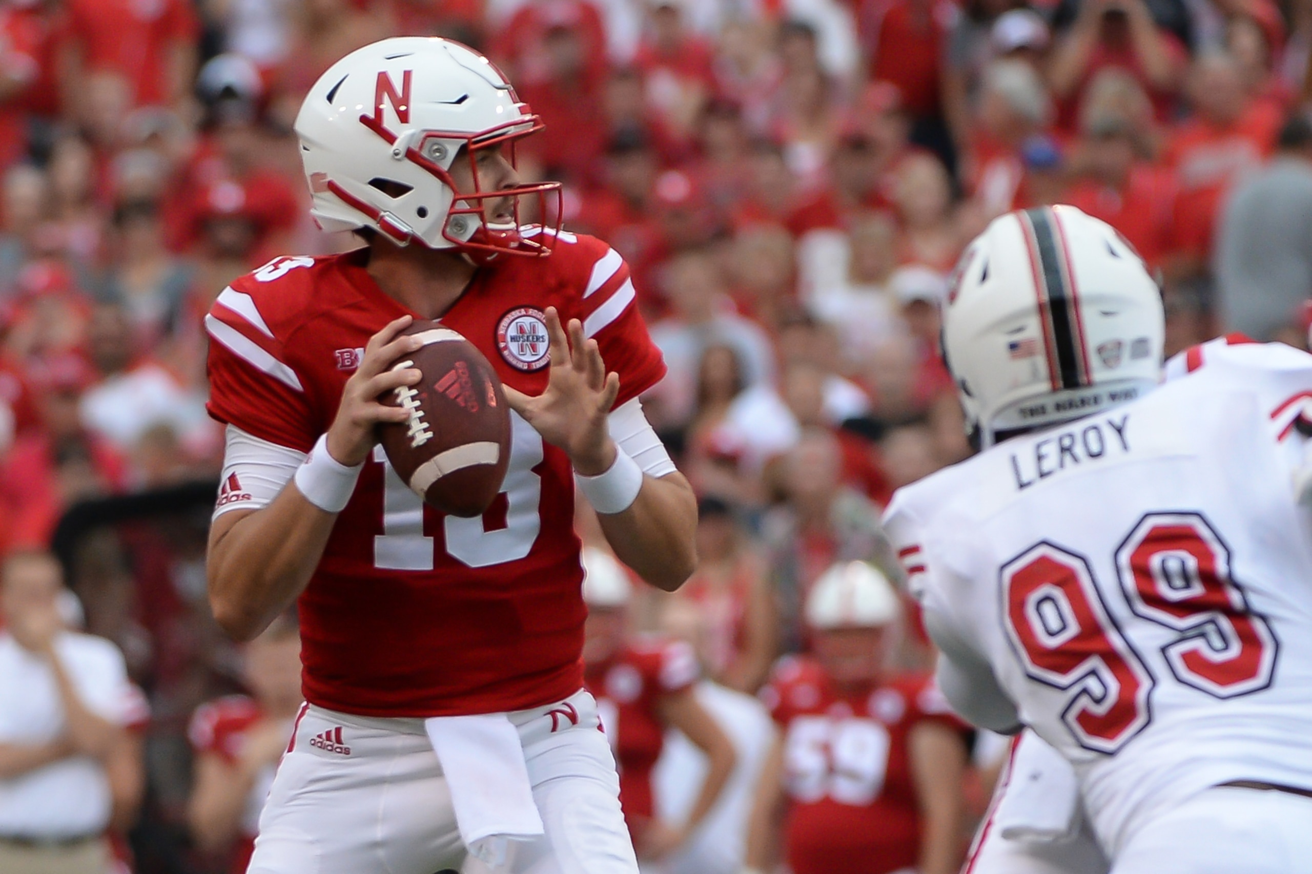 Tanner Lee threw two touchdowns, but he threw them both to the wrong team.
