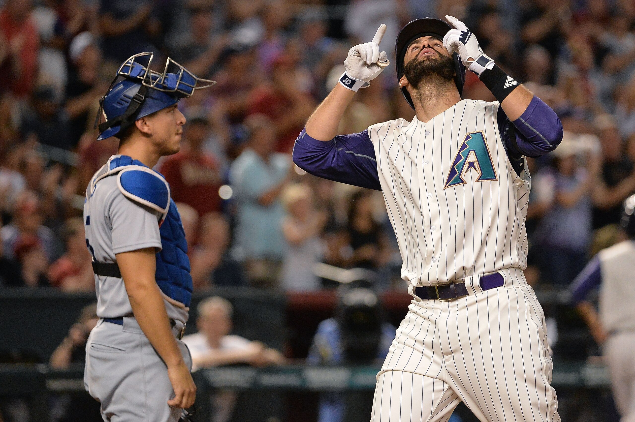 The Diamondbacks notched a pair of three-game sweeps over the Dodgers in late August and early September, including a game in which Martinez hit four homers.