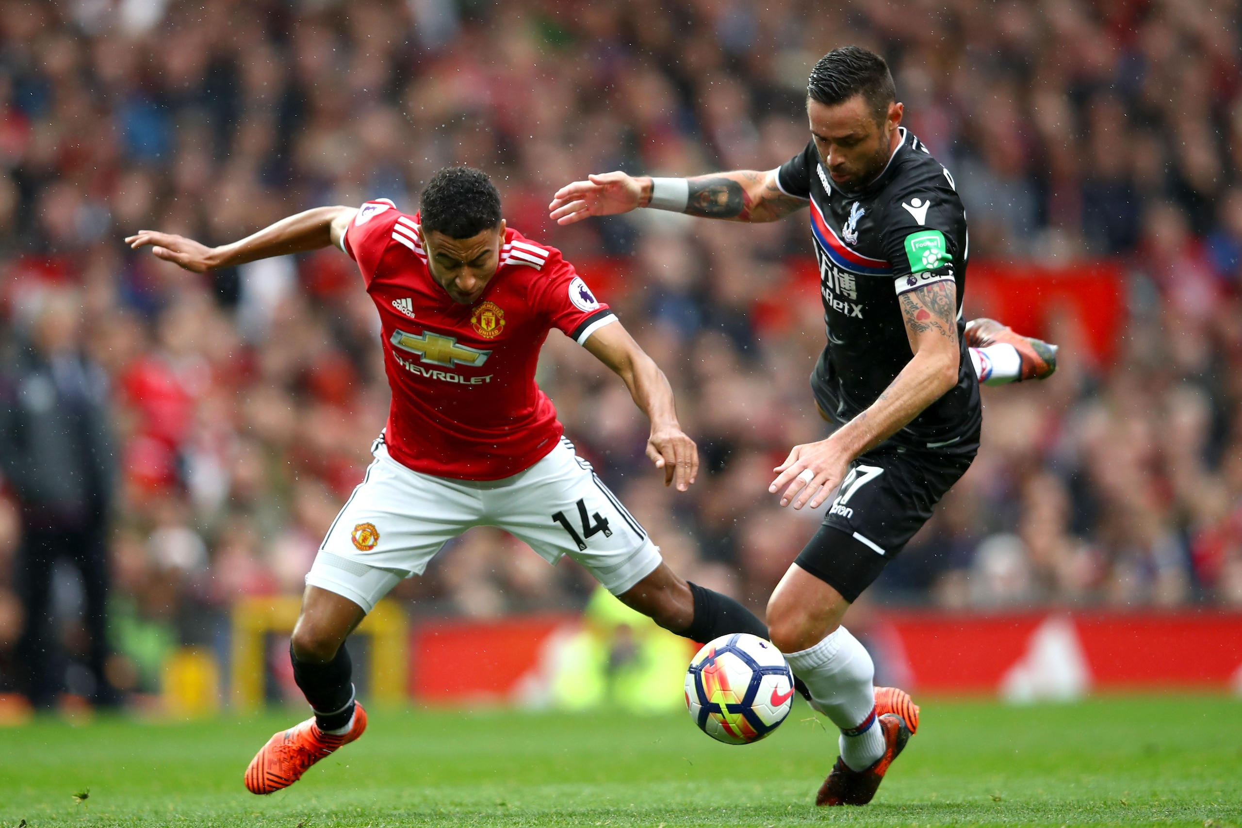 Lingard takes a tumble against Palace. Lingard takes a tumble against Palace.