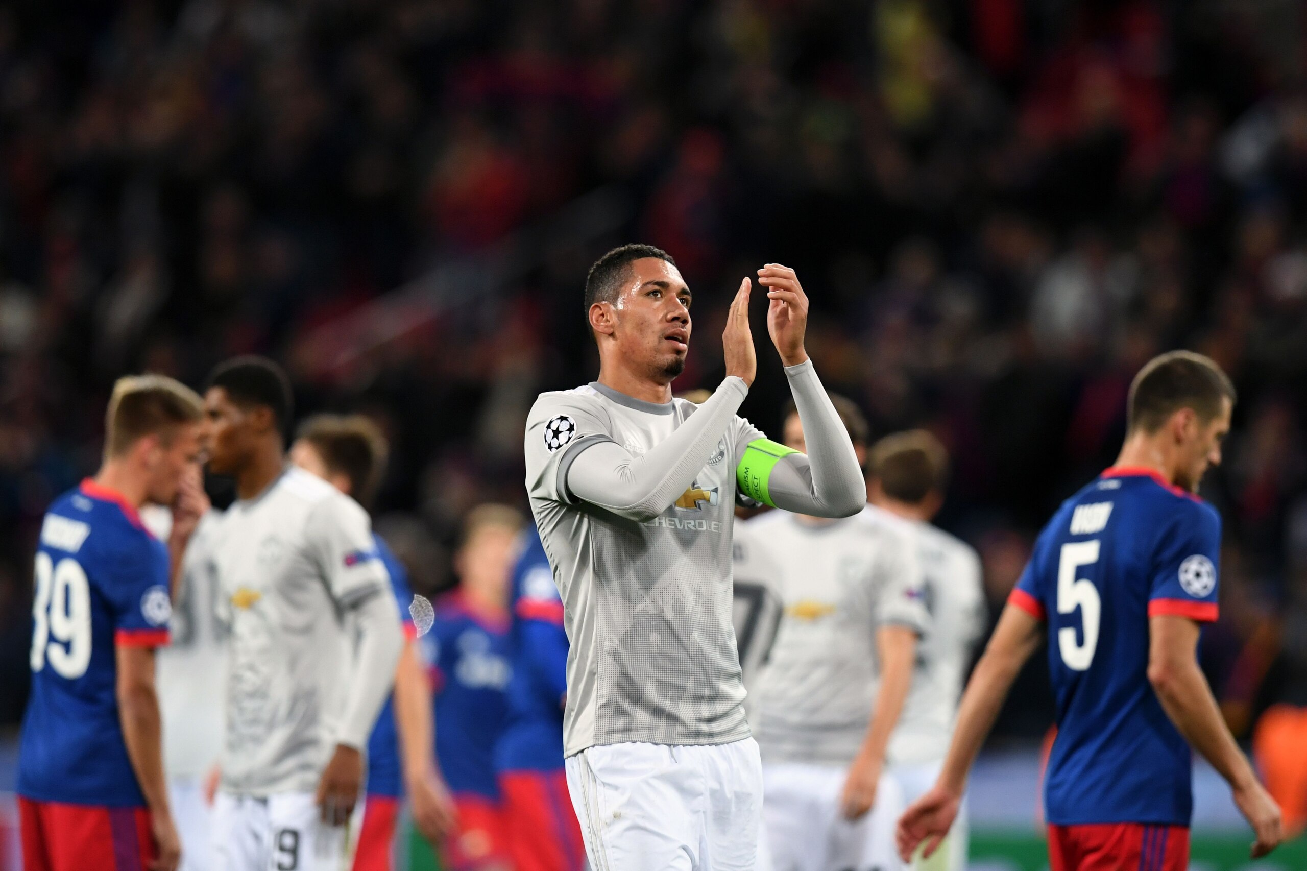 Smalling applauds travelling supporters in Moscow. Smalling applauds travelling supporters in Moscow.
