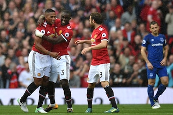 Antonio Valencia is congratulated after his wonder-goal against Everton.