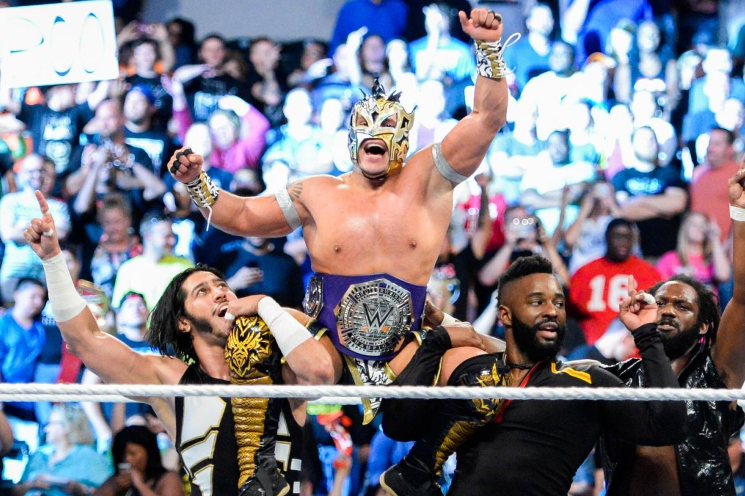 Kalisto celebrating his cruiserweight title win on Raw.