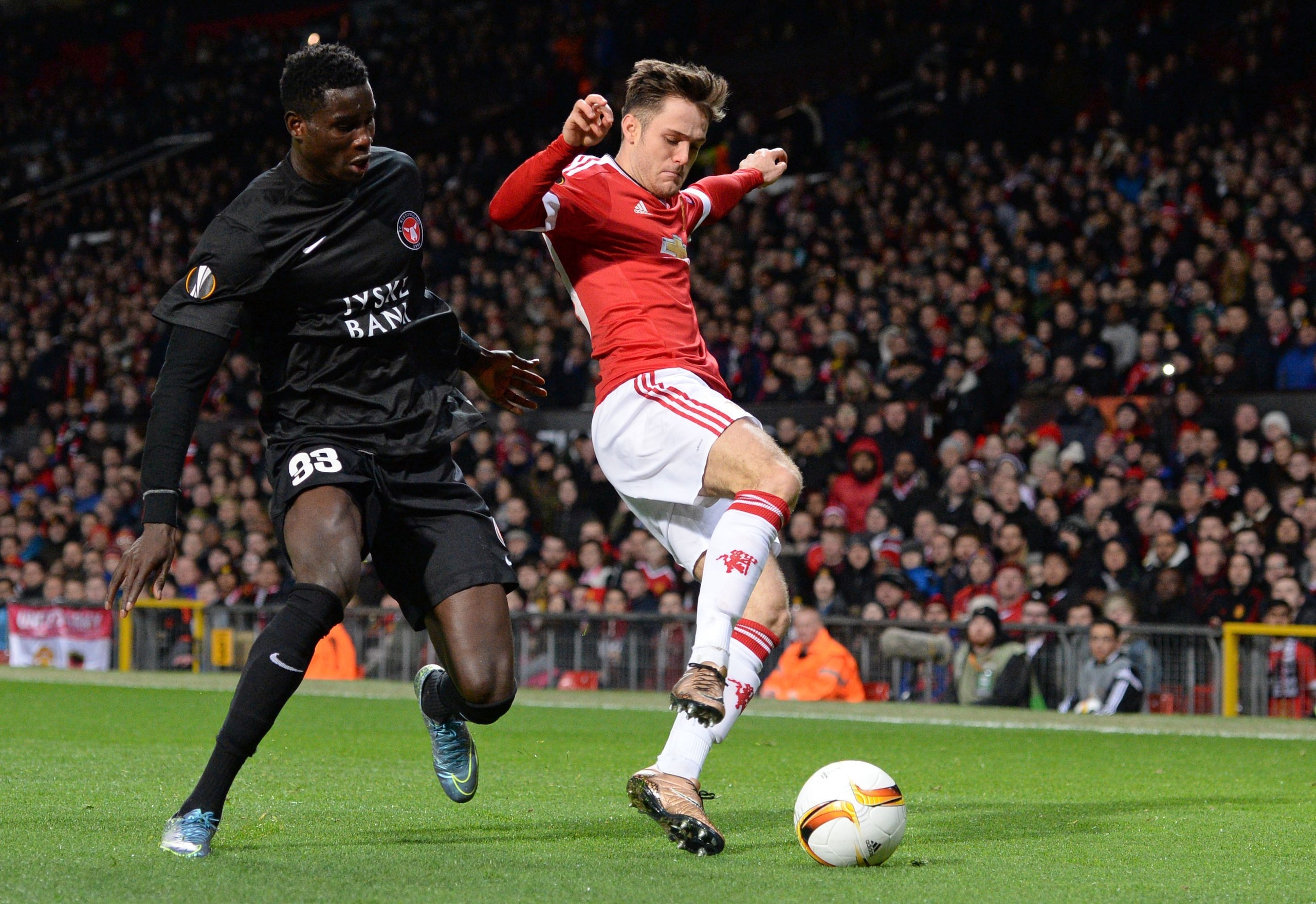 Joe Riley in first-team action against FC Midtjylland.