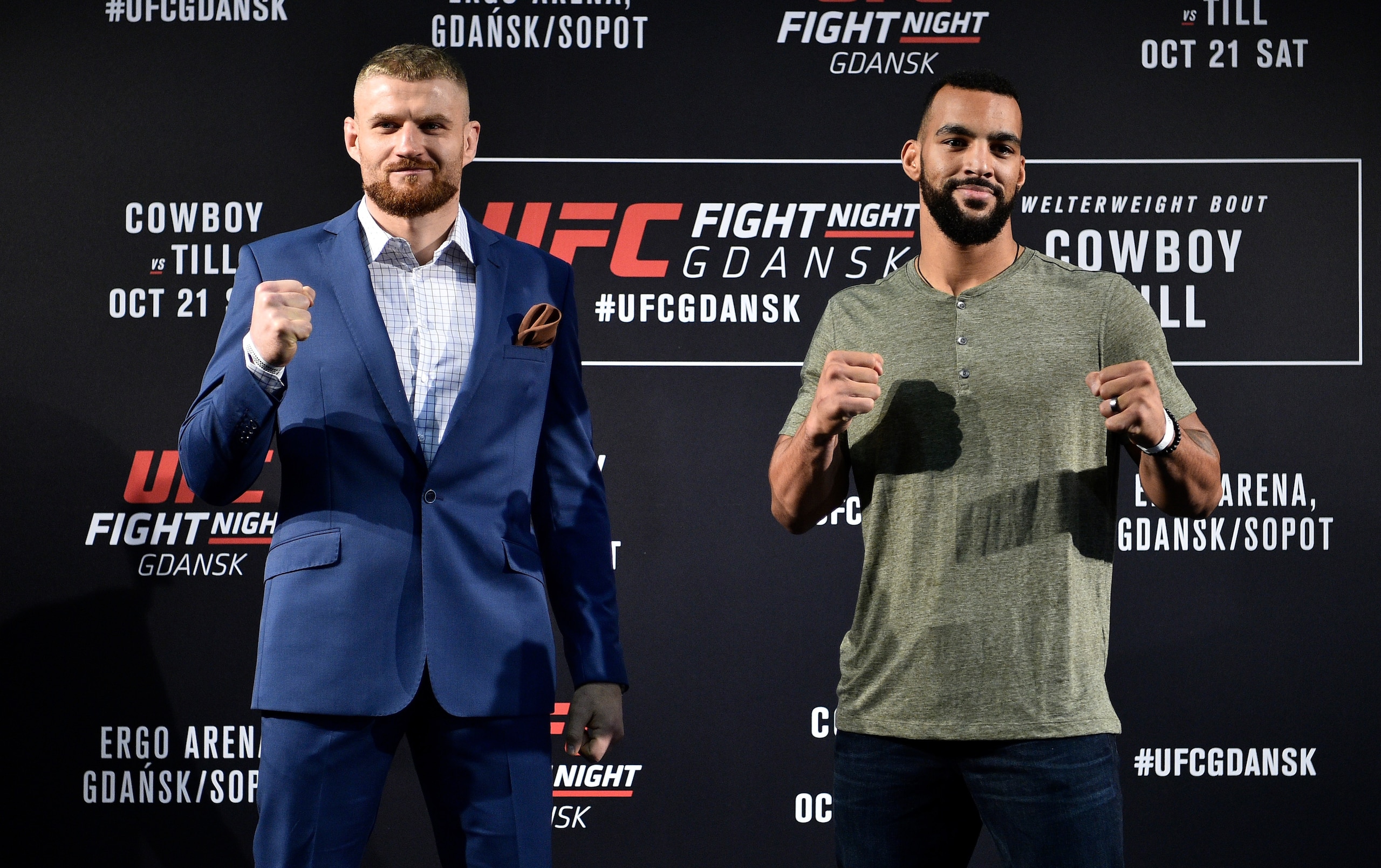 Blachowicz (left) and Clark (right) pose for pictures before the fight.
