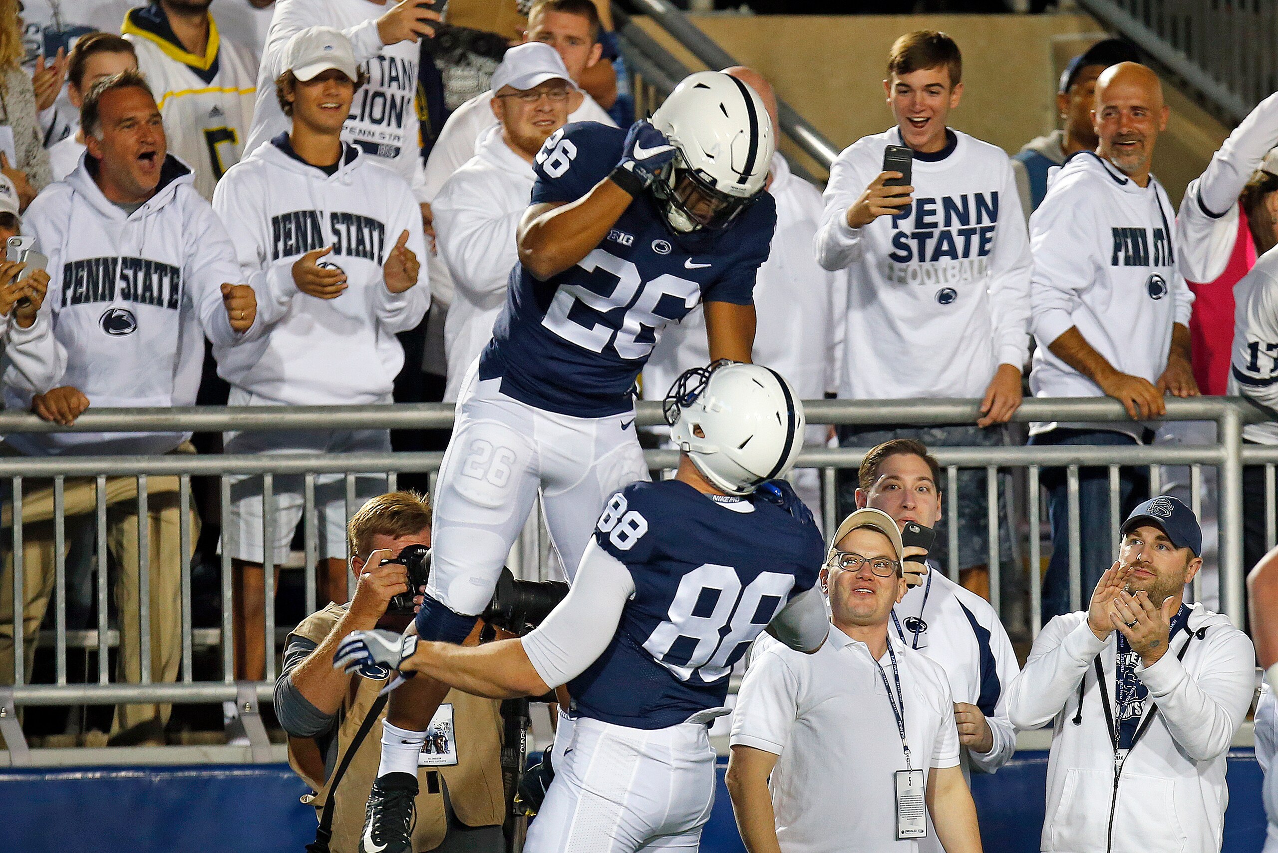 Saquon Barkley (26) and Mike Gesicki (88)