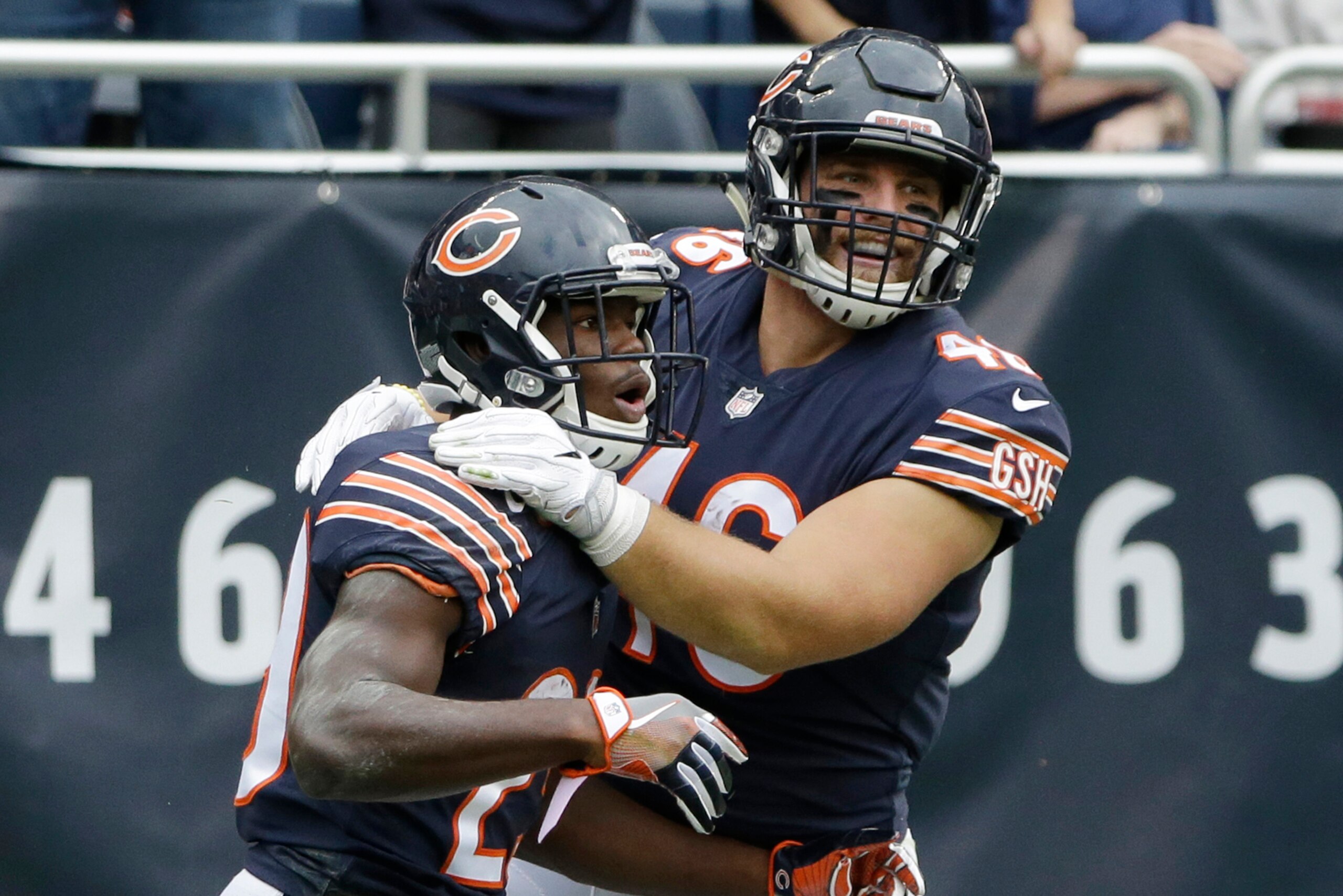 Chicago Bears running back Tarik Cohen (29) and fullback Michael Burton (46) celebrate after Cohen's 70-yard pass reception during the first half of an NFL football game against the Carolina Panthers, Sunday, Oct. 22, 2017, in Chicago. (AP Photo/Nam Y. Hu