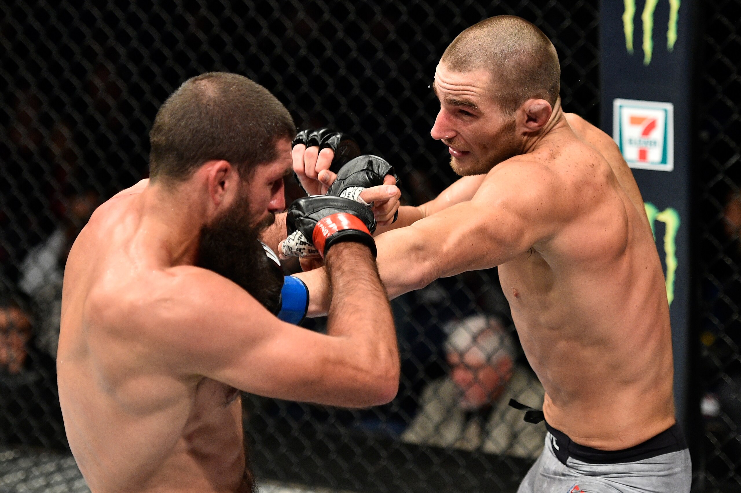 Sean Strickland (right) hits Court McGee
