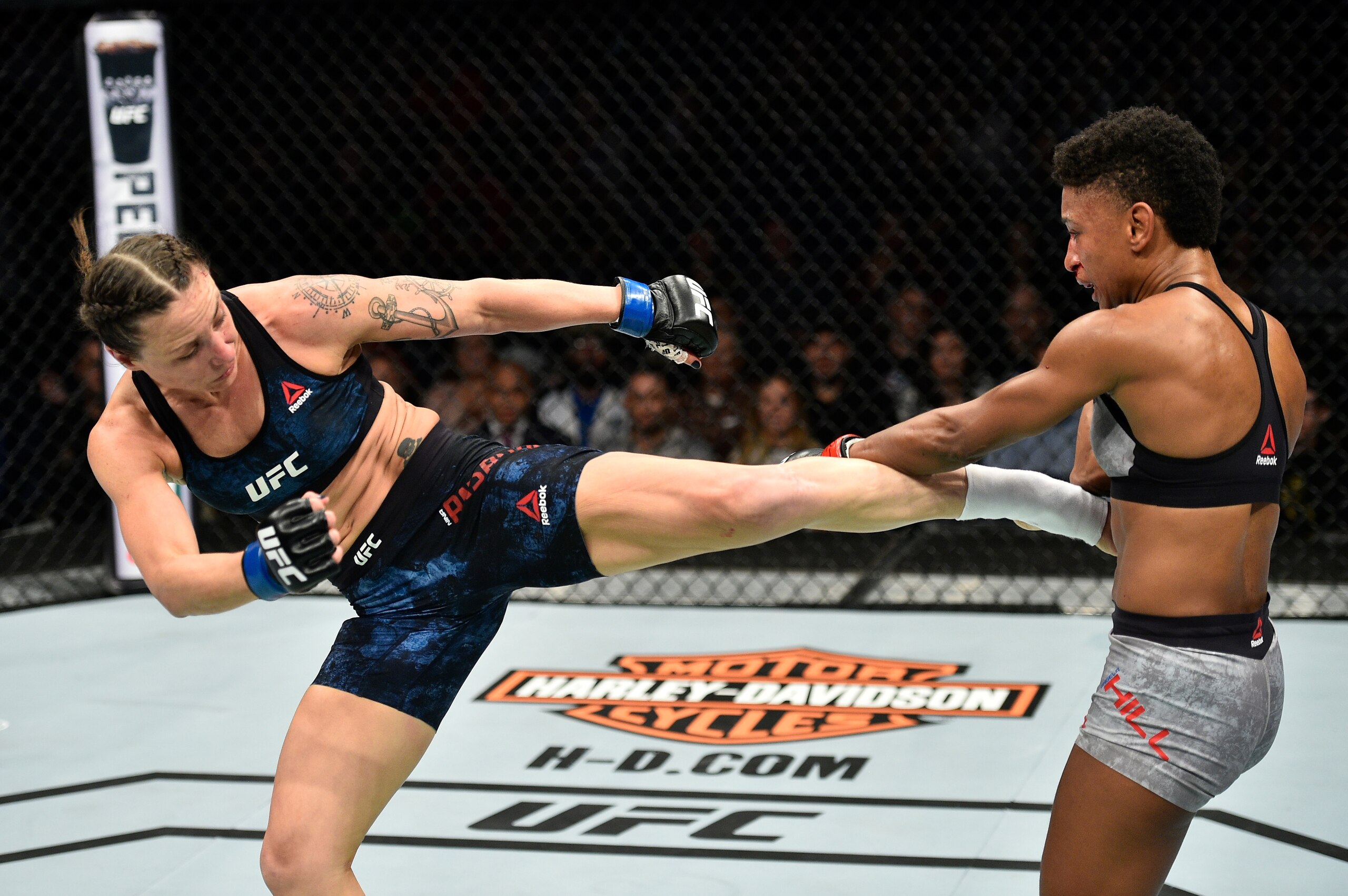 Nina Ansaroff (left) defeated Angela Hill (right) on the evening's undercard.