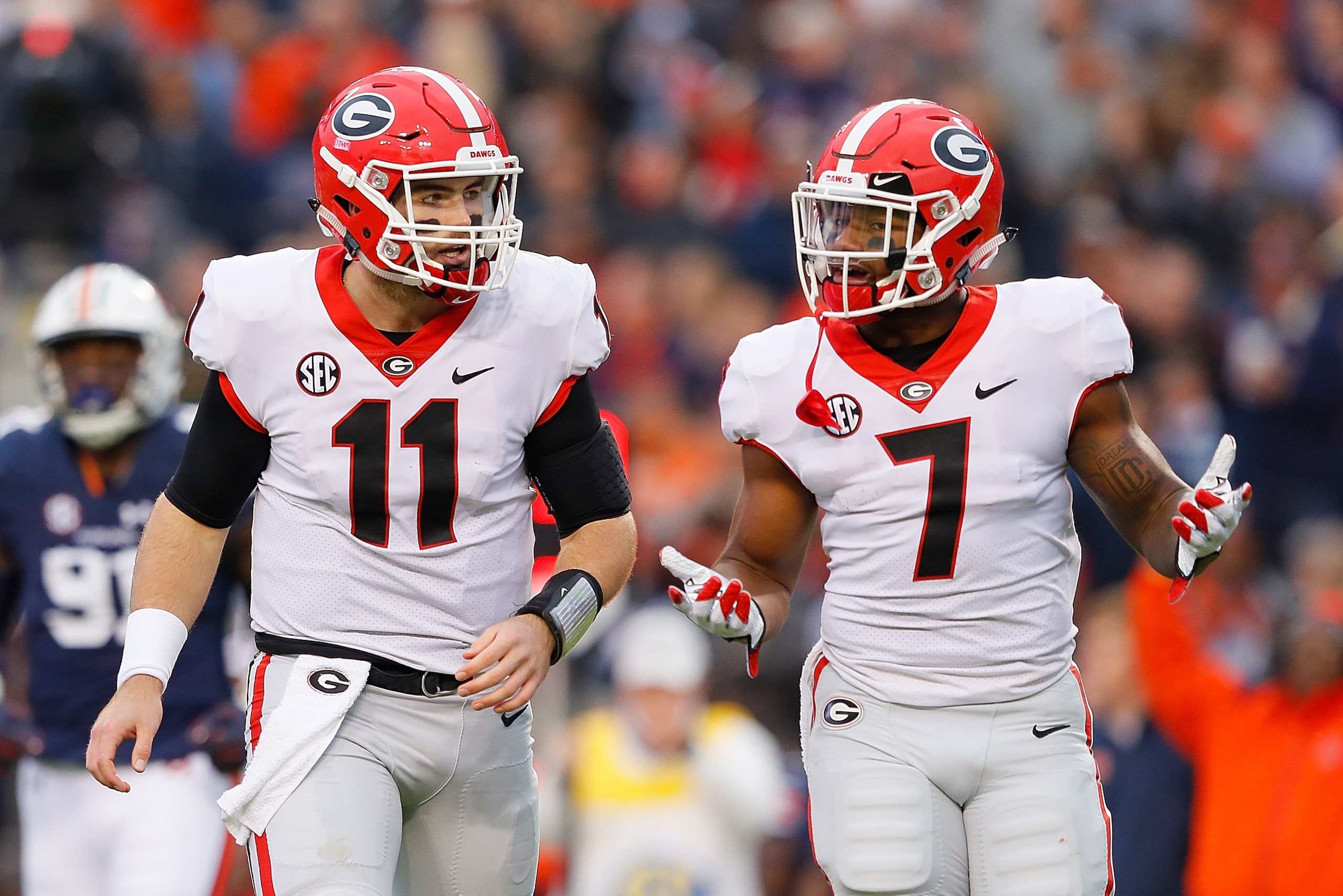 Jake Fromm (11) and D'Andre Swift (7)
