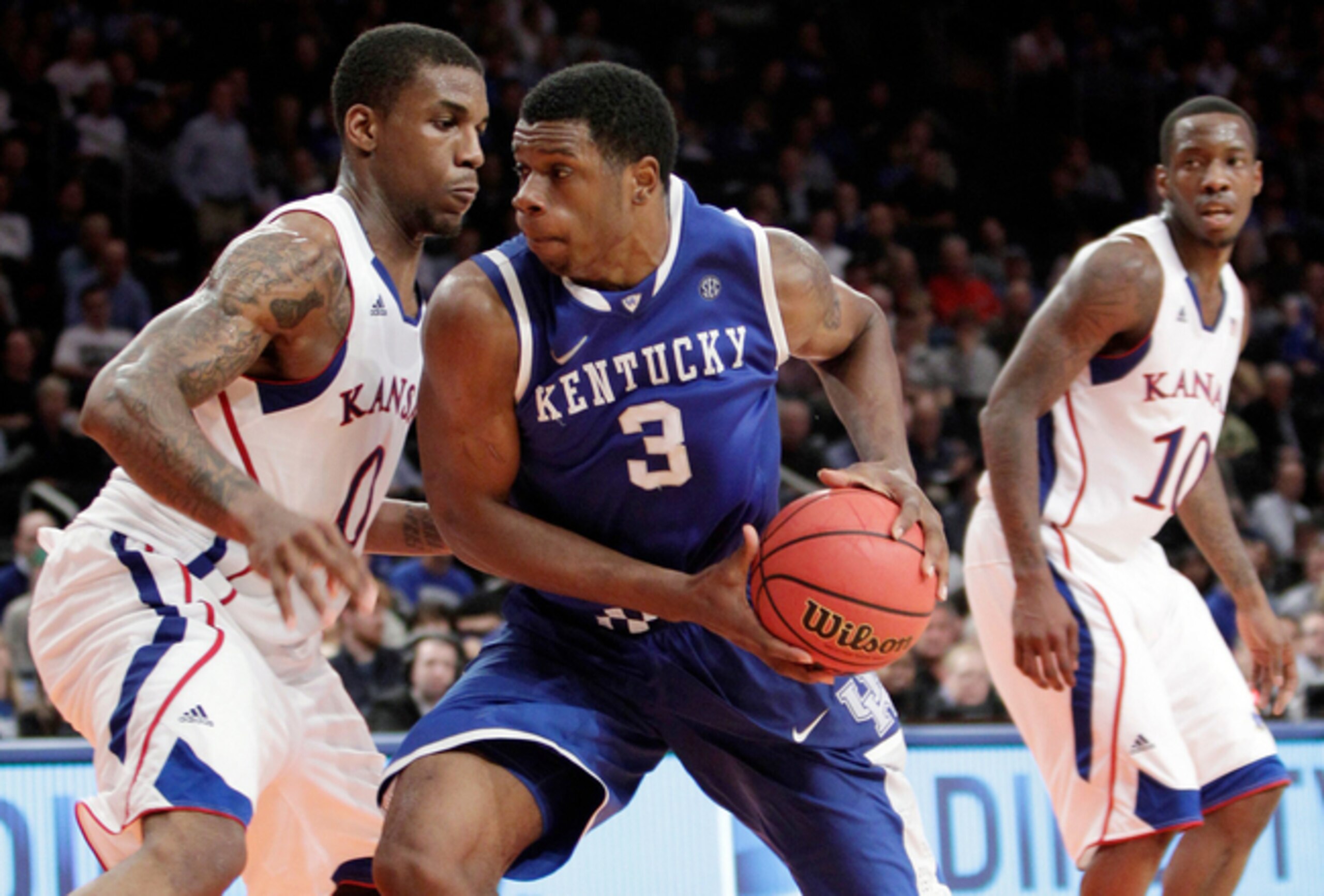 Terrence Jones (3), Thomas Robinson (0) and Tyshawn Taylor