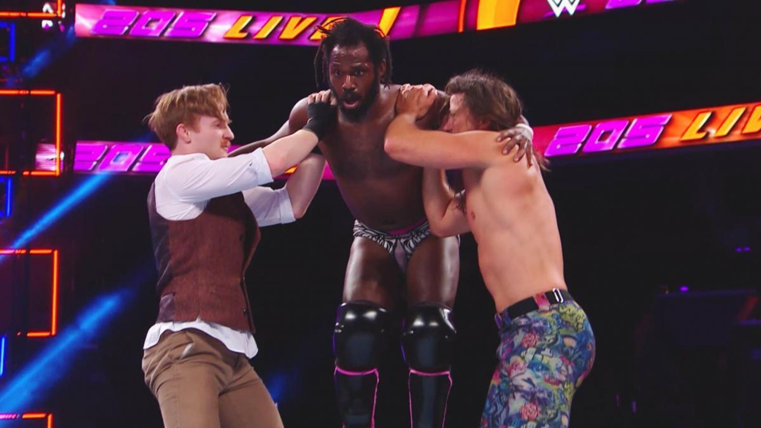 Brian Kendrick and Jack Gallagher send Rich Swann for a ride.
