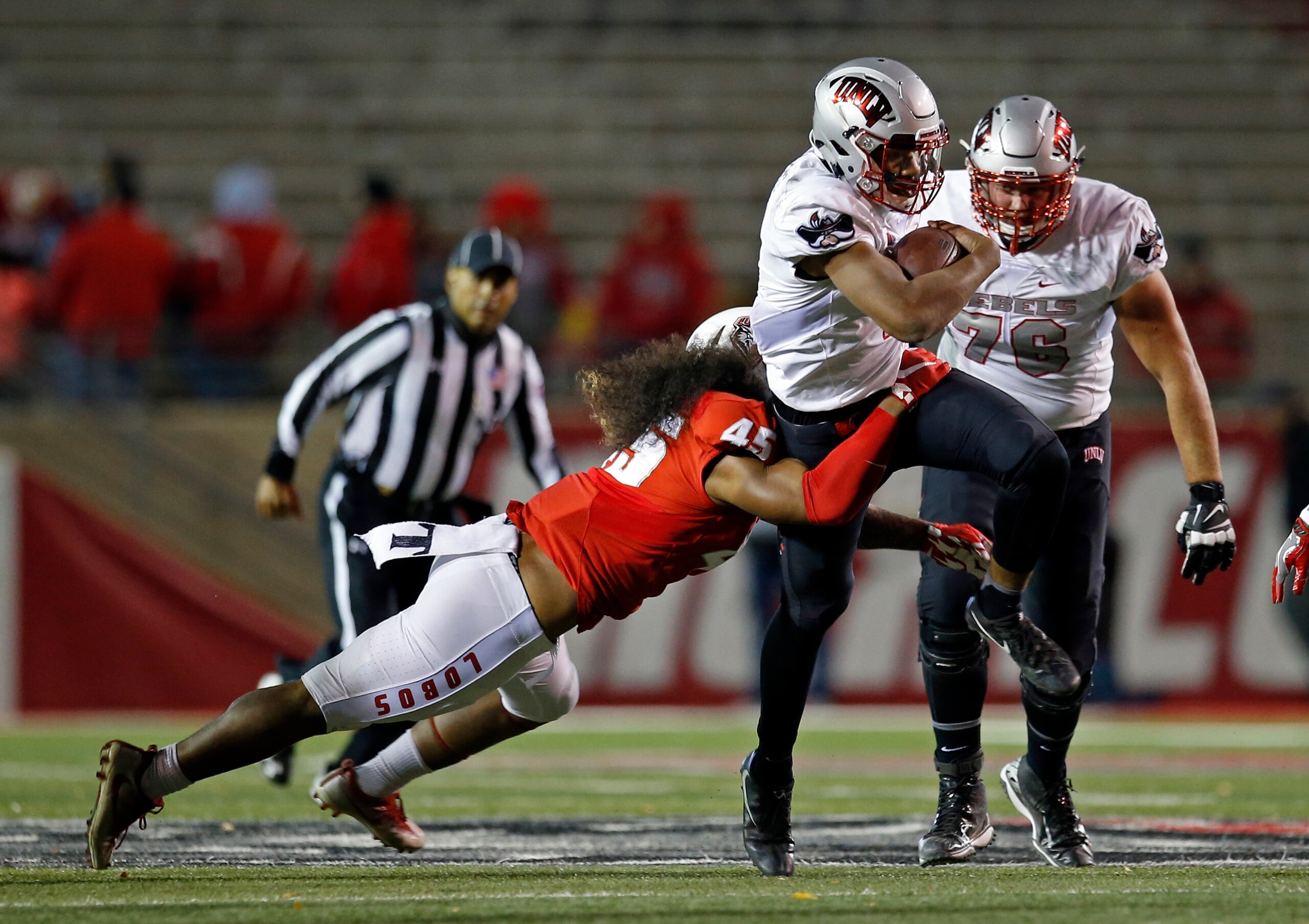 UNLV's Armani Rogers sheds a tackle.