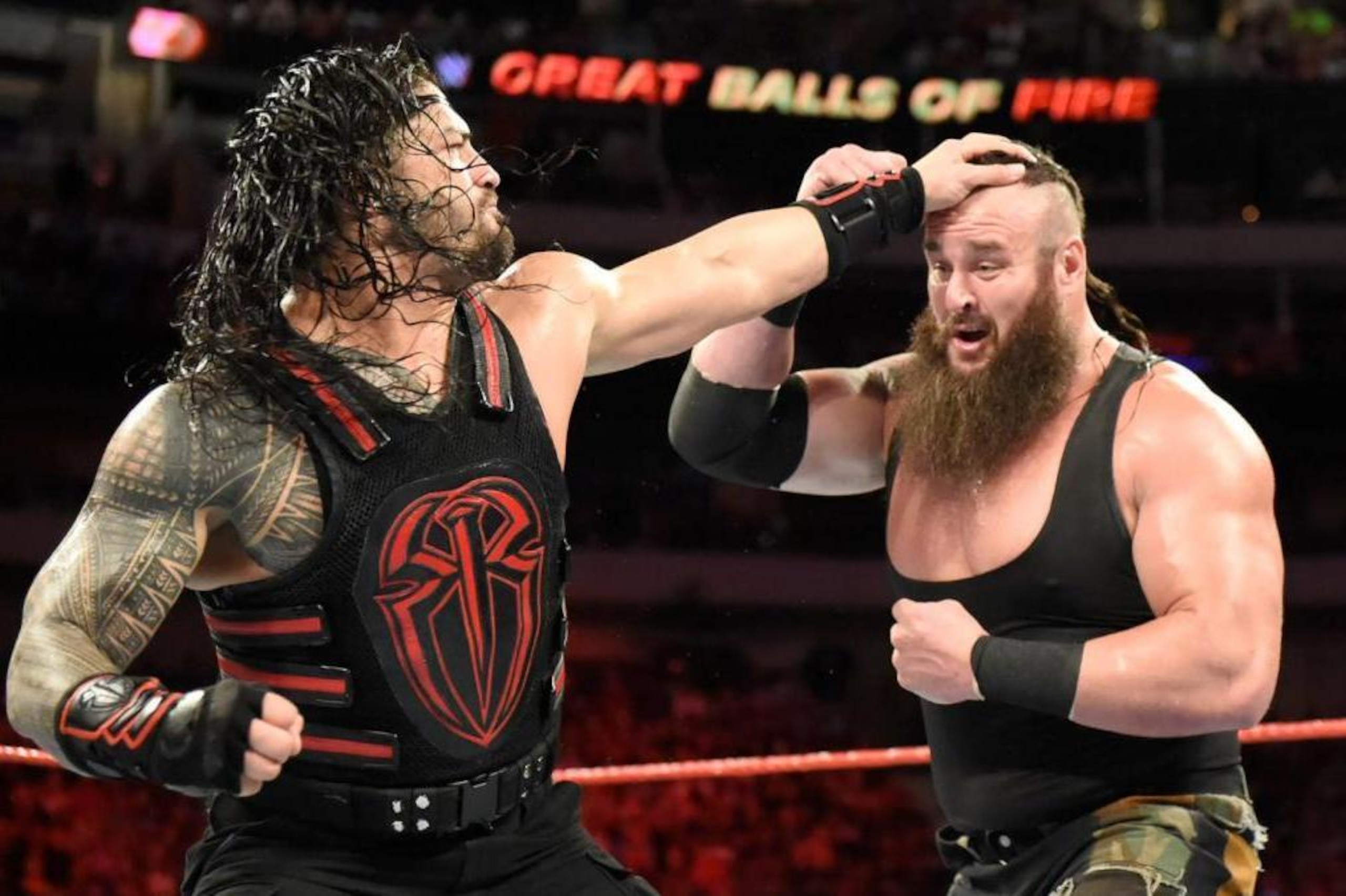 Roman Reigns and Braun Strowman in one of their many classic battles.