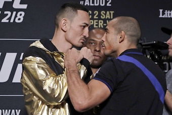 Max Holloway (left) and Jose Aldo.