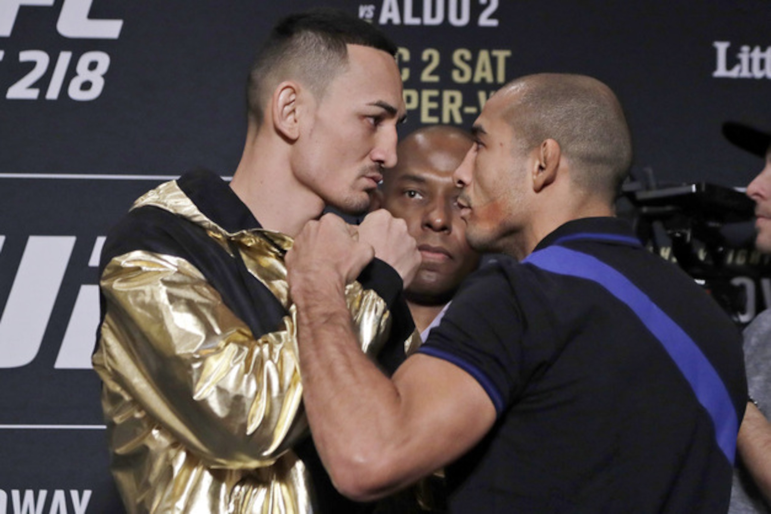 Max Holloway (left) and Jose Aldo. Max Holloway (left) and Jose Aldo.