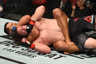 Dominick Reyes (left) chokes out Jeremy Kimball