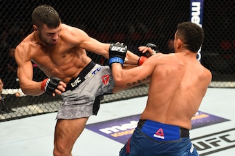 David Teymur (left) kicks Drakkar Klose.