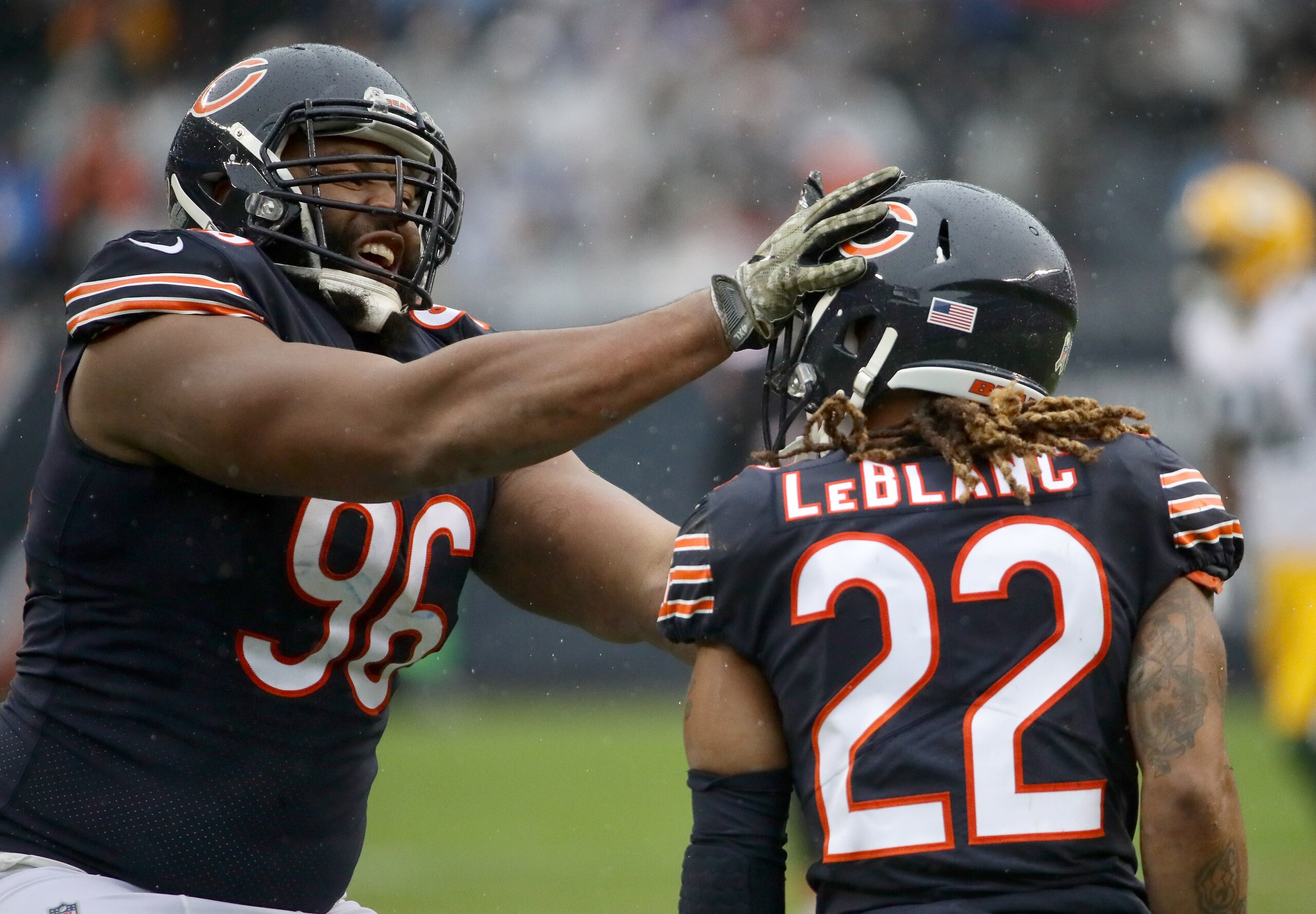 CHICAGO, IL - NOVEMBER 12:  Akiem Hicks #96 and  Cre'von LeBlanc #22 of the Chicago Bears celebrate after LeBlanc got a sack against the Green Bay Packers in the second quarter at Soldier Field on November 12, 2017 in Chicago, Illinois.  (Photo by Jonatha