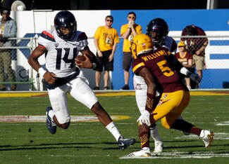 Khalil Tate is an electric presence at quarterback for Arizona.