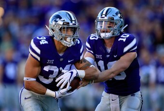 Alex Barnes (34) and Skylar Thompson (10)