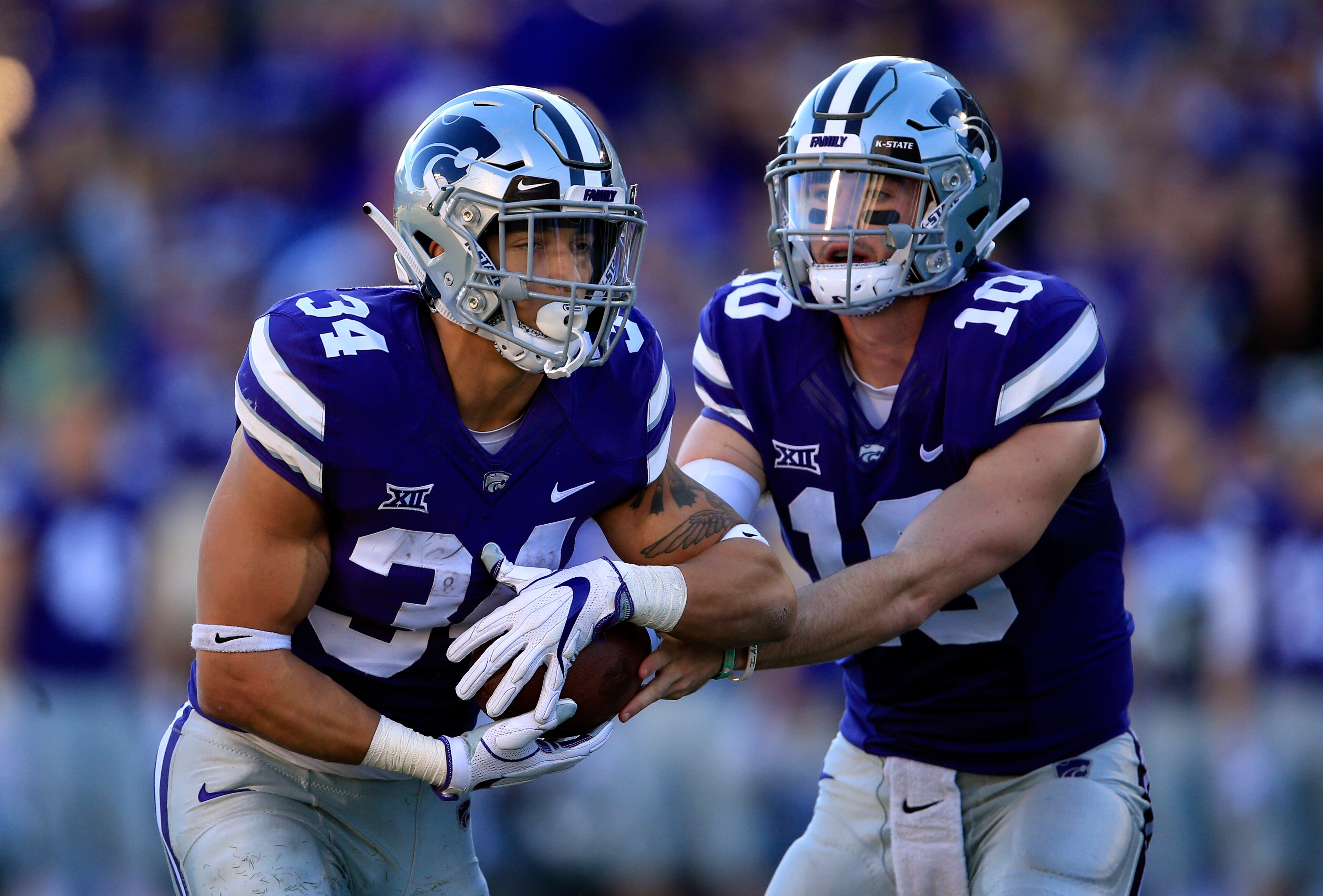 Alex Barnes (34) and Skylar Thompson (10)