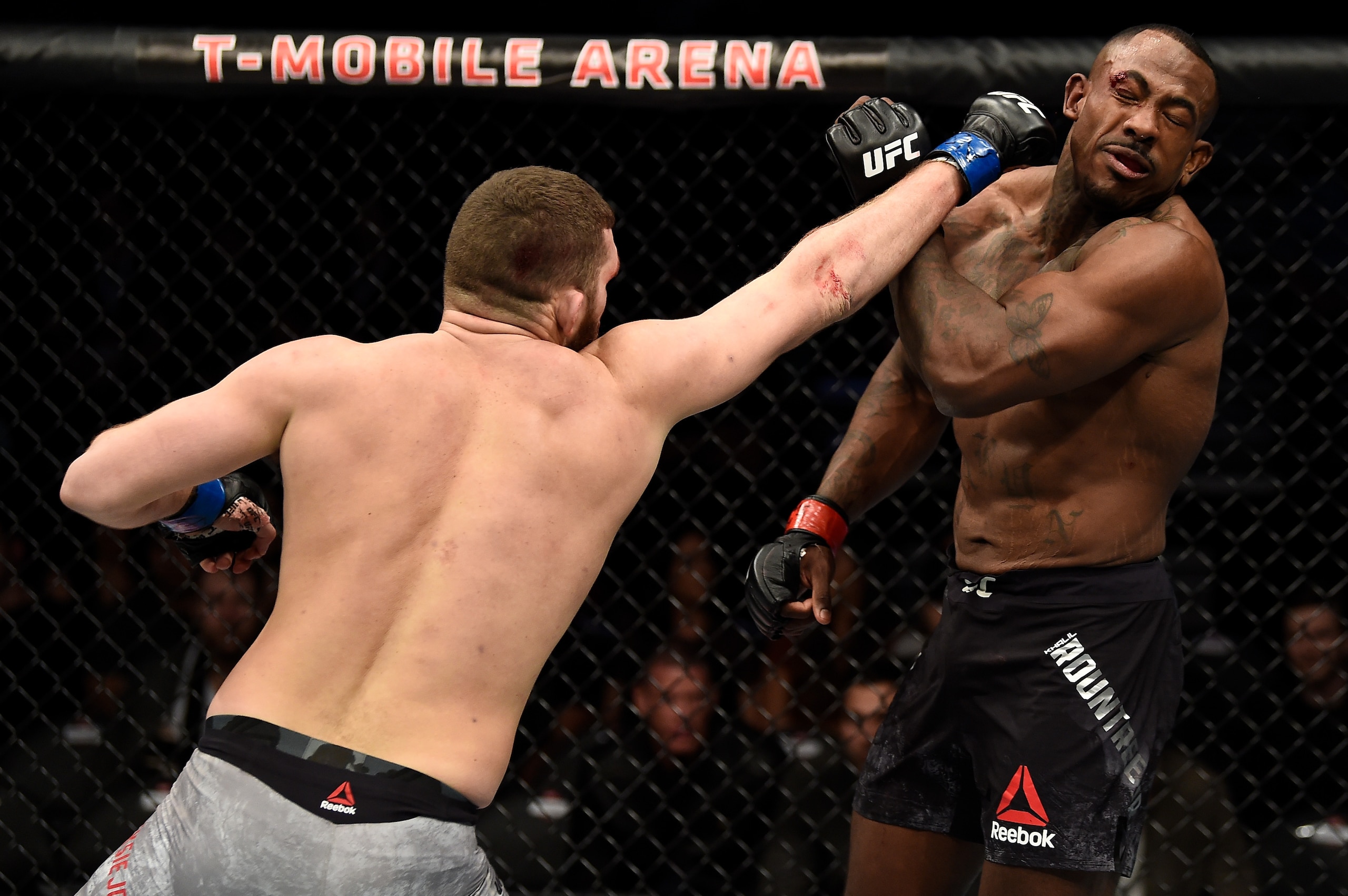 Michal Oleksiejczuk (left) attacks Khalil Rountree.