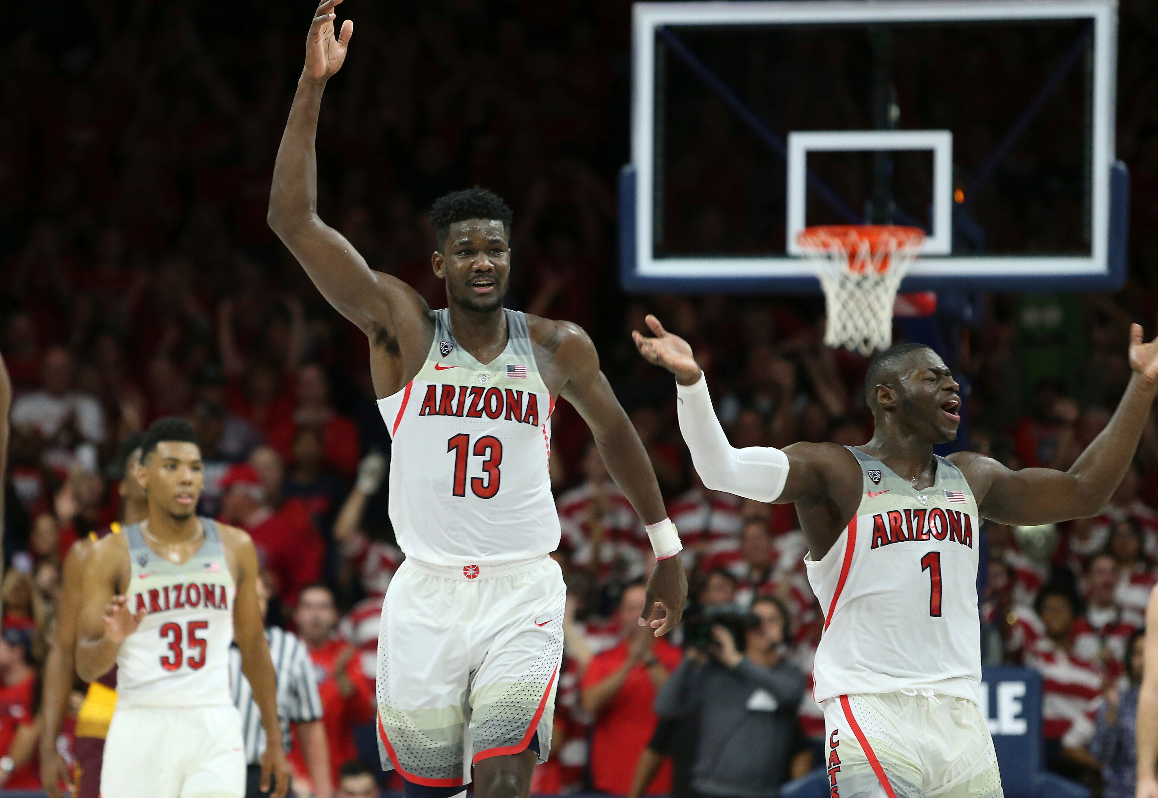 Deandre Ayton (13), Rawle Alkins (1) and Allonzo Trier (35)
