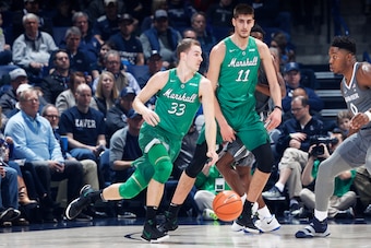 Jon Elmore (33) and Ajdin Penava (11)