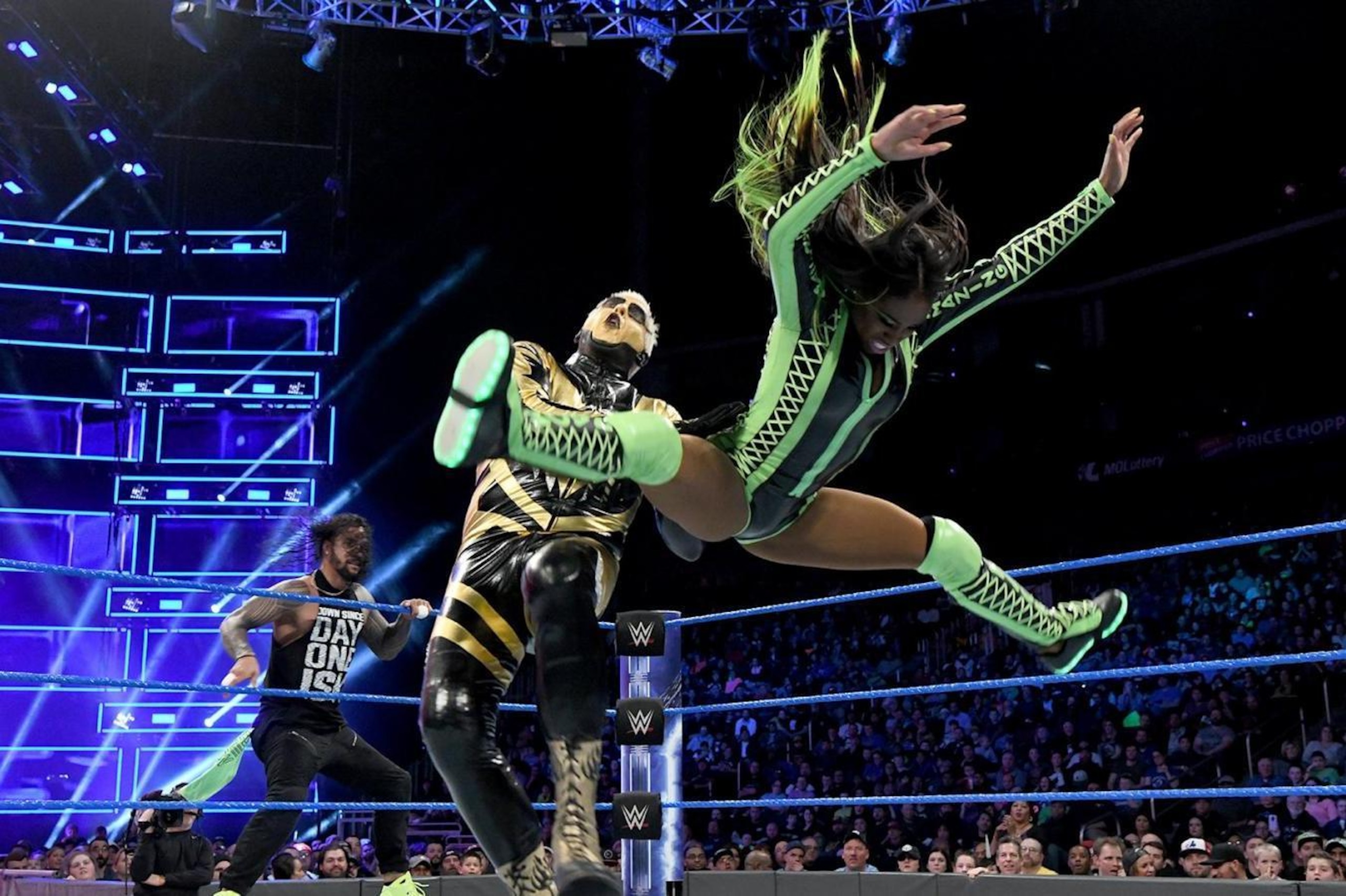 Naomi hits Goldust with the Rear View.