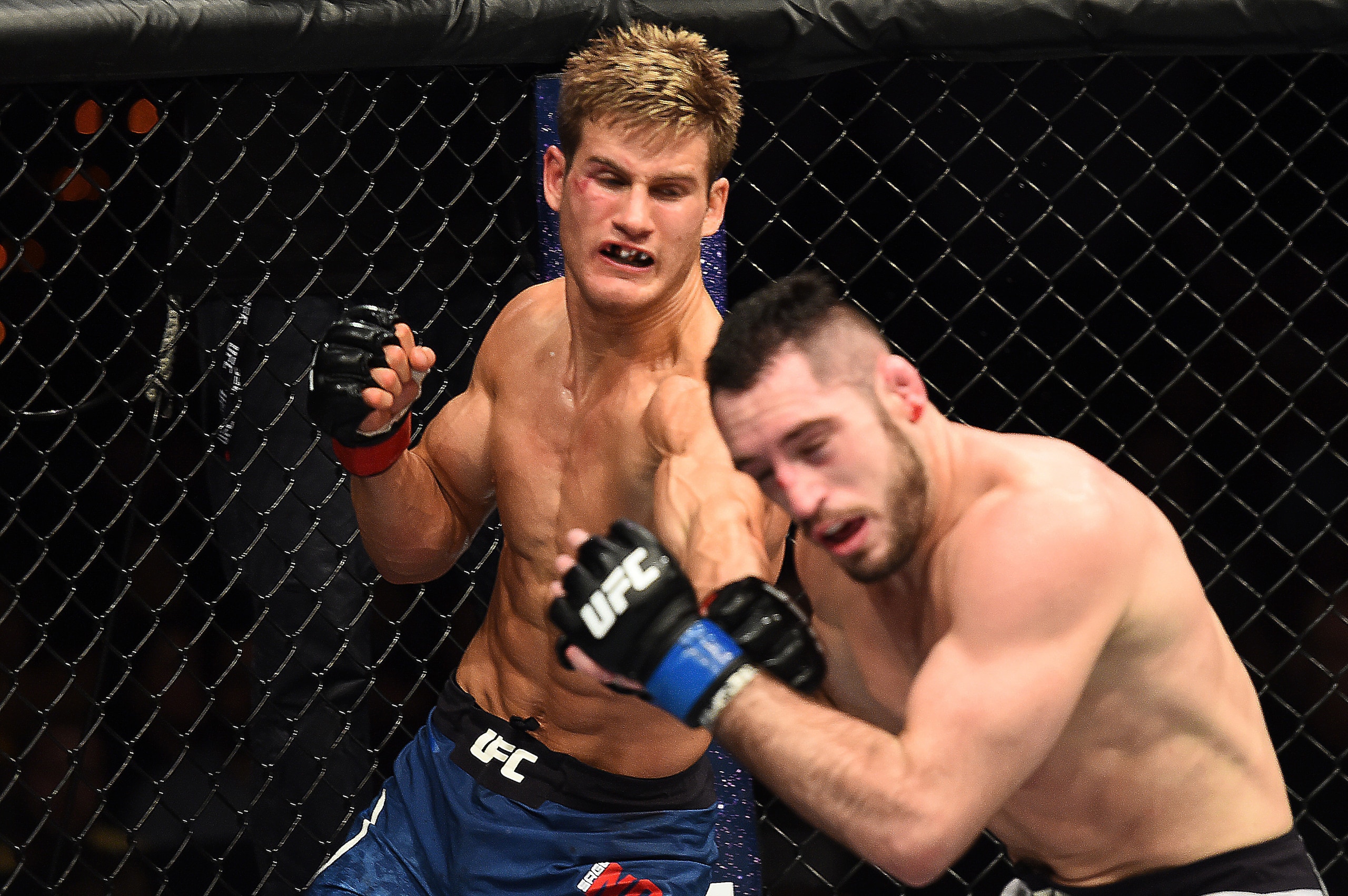 Sage Northcutt (left) hits Thibault Gouti