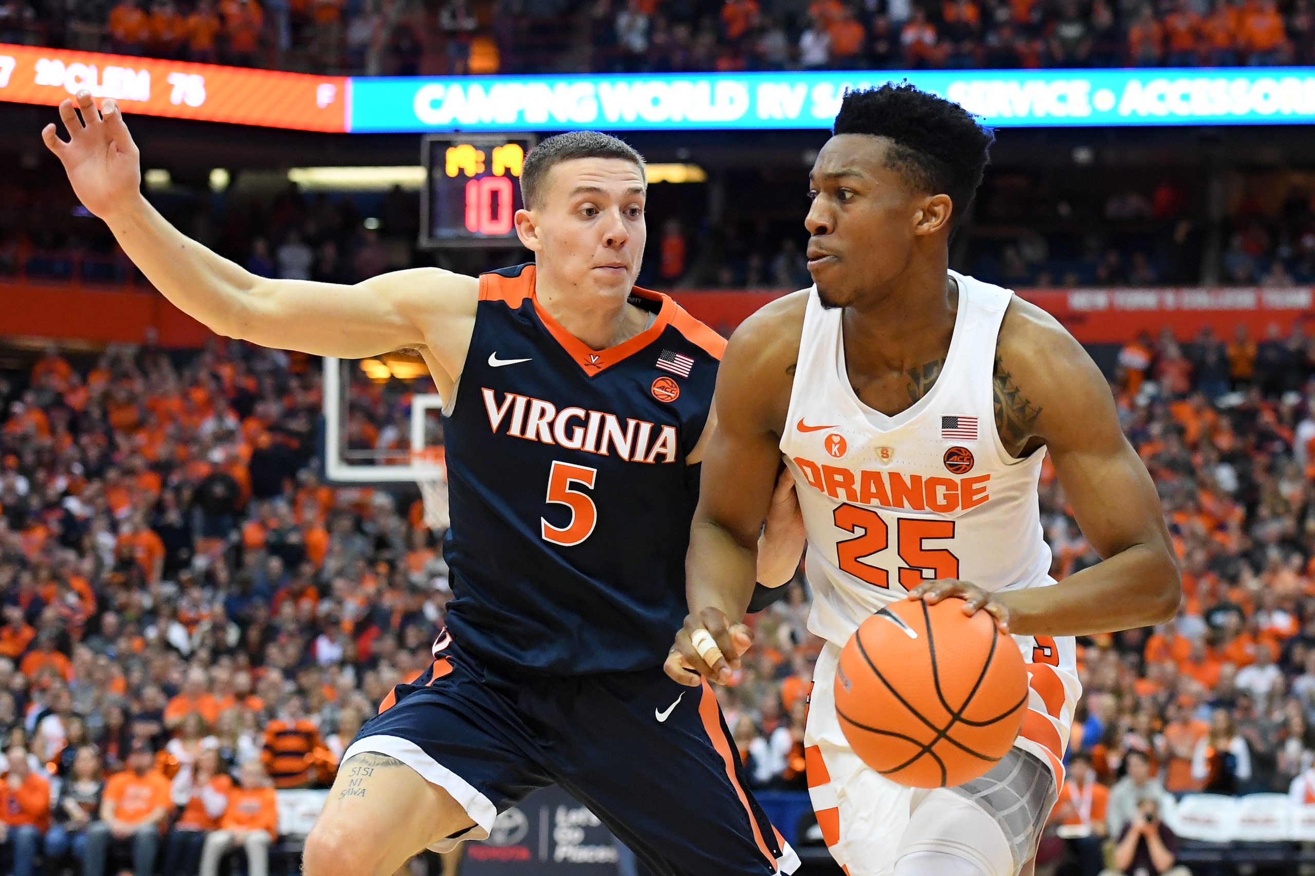 Kyle Guy (5) and Tyus Battle (25)
