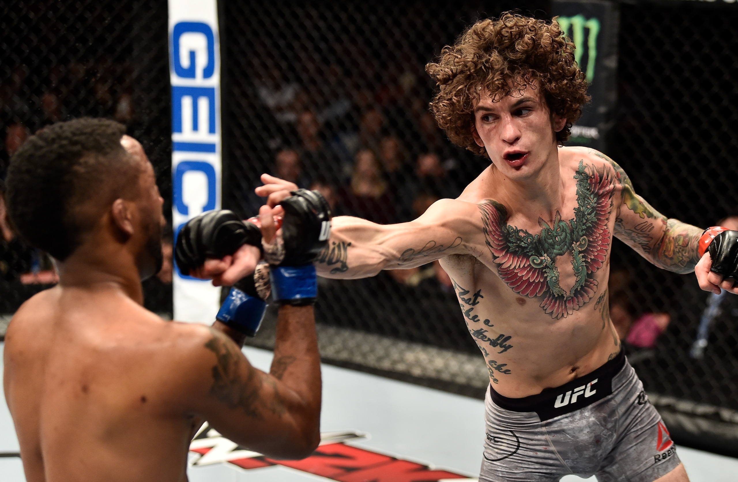 LAS VEGAS, NV - DECEMBER 01:  (R-L) Sean O'Malley punches Terrion Ware in their bantamweight bout during the TUF Finale event inside Park Theater on December 01, 2017 in Las Vegas, Nevada. (Photo by Jeff Bottari/Zuffa LLC/Zuffa LLC via Getty Images)
