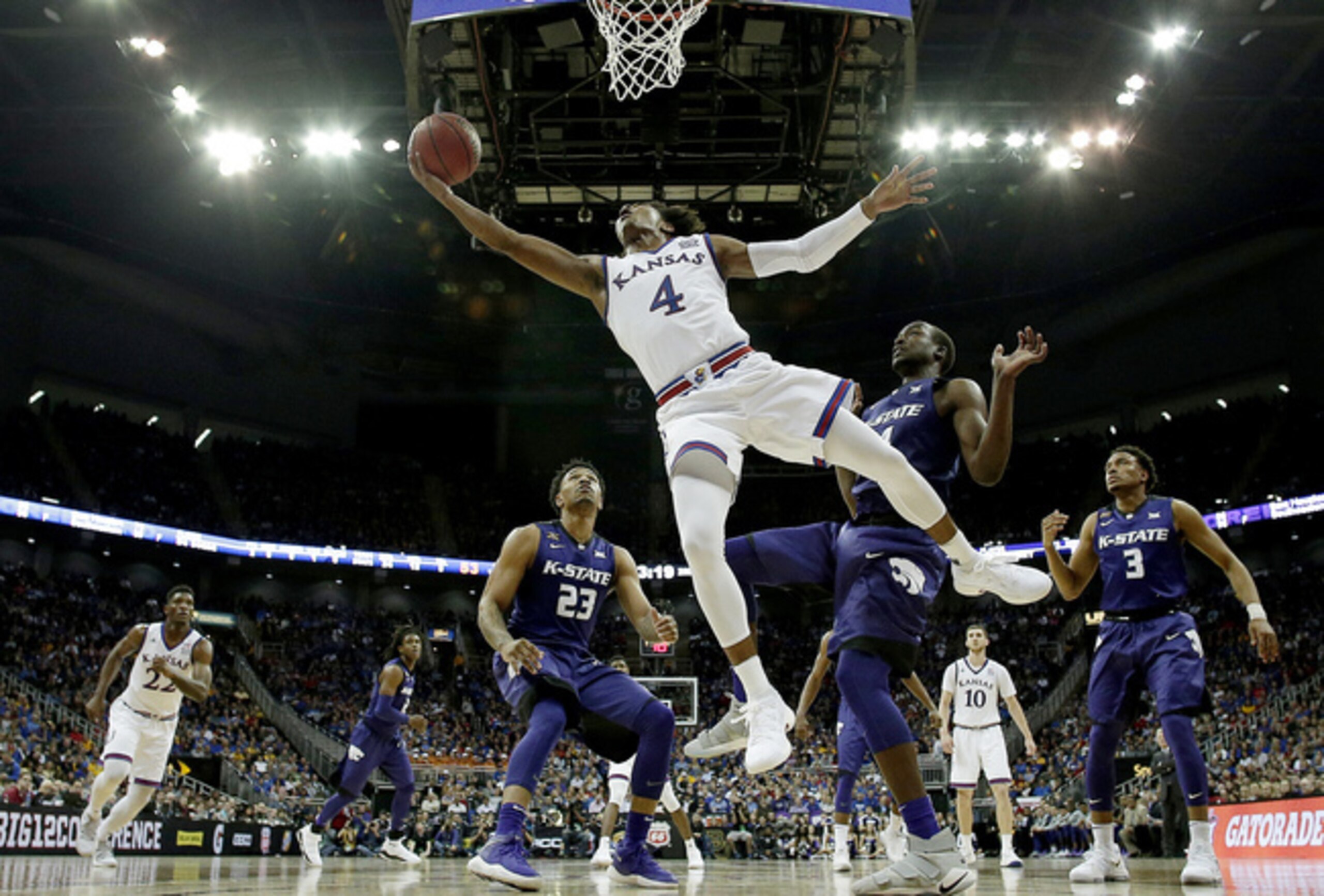 Devonte' Graham attempts a layup against Kansas State in the Big 12 tournament semis.