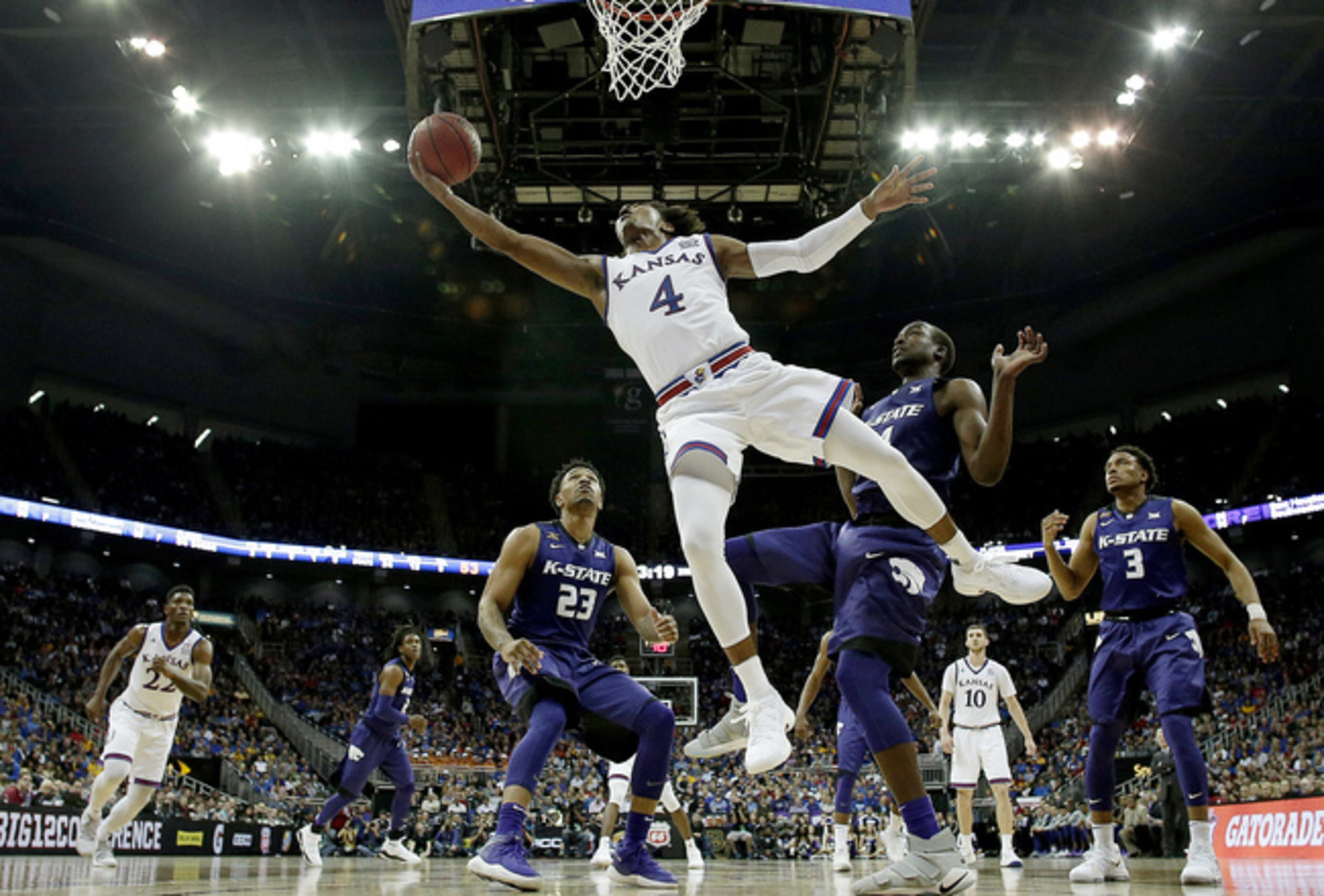 Devonte' Graham attempts a layup against Kansas State in the Big 12 tournament semis.