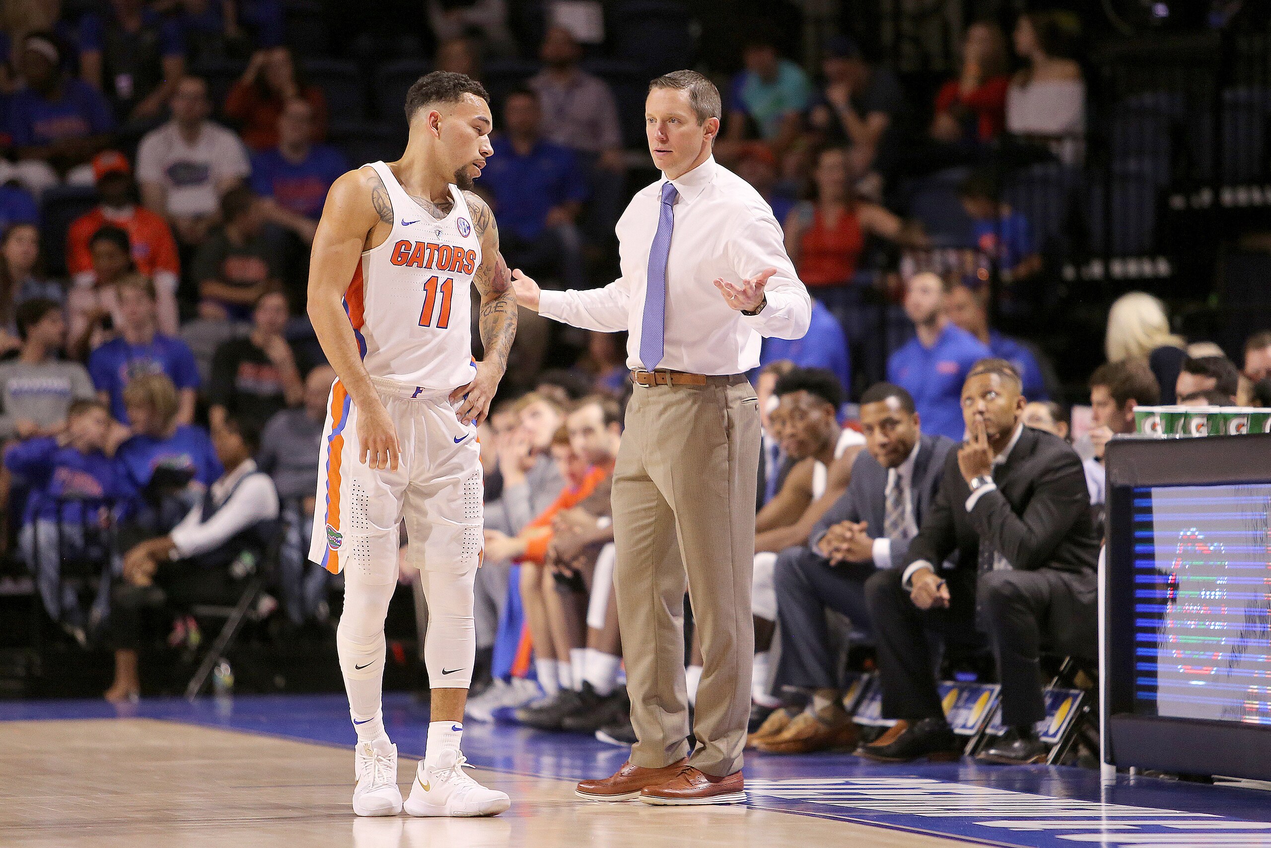 Florida's Chris Chiozza and Mike White
