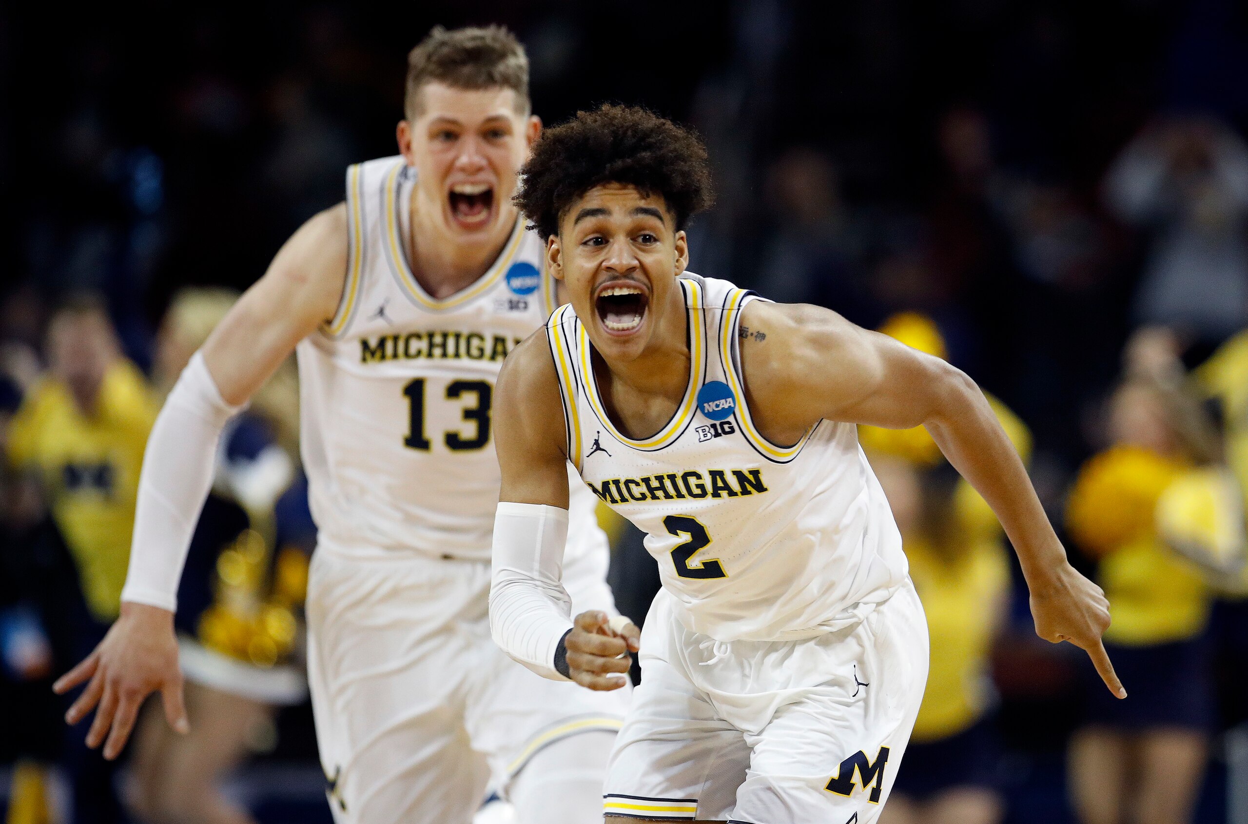 Jordan Poole (2) and Moritz Wagner (13)