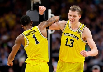 Charles Matthews (1) and Moritz Wagner (13)