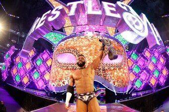 Cedric Alexander celebrating with the Cruiserweight Championship at WrestleMania 34.