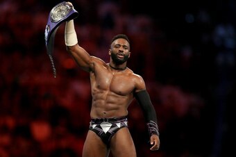 Cedric Alexander celebrating a successful title defense in Saudi Arabia.