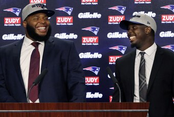 New England Patriots left tackle Isaiah Wynn (left) and running back Sony Michel (right)