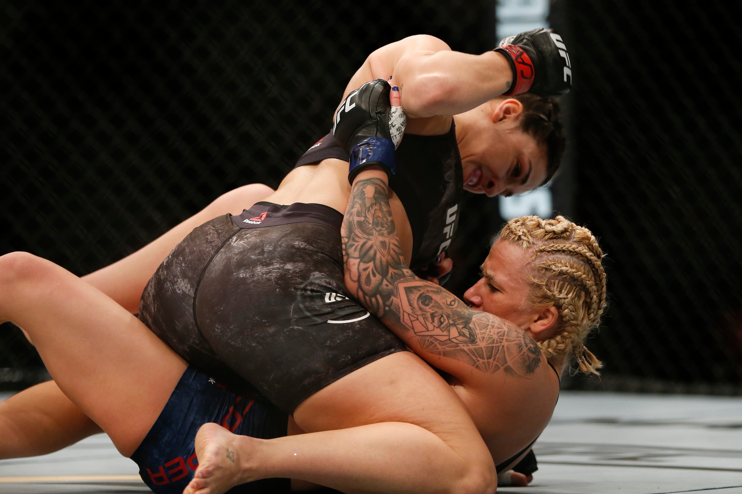 Mackenzie Dern (top) and Amanda Cooper