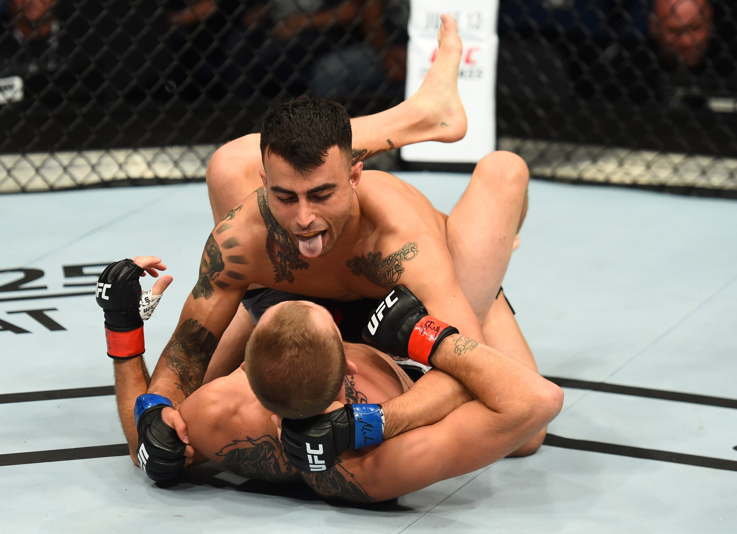 Makwan Amirkhani (top) controlled Jason Knight.