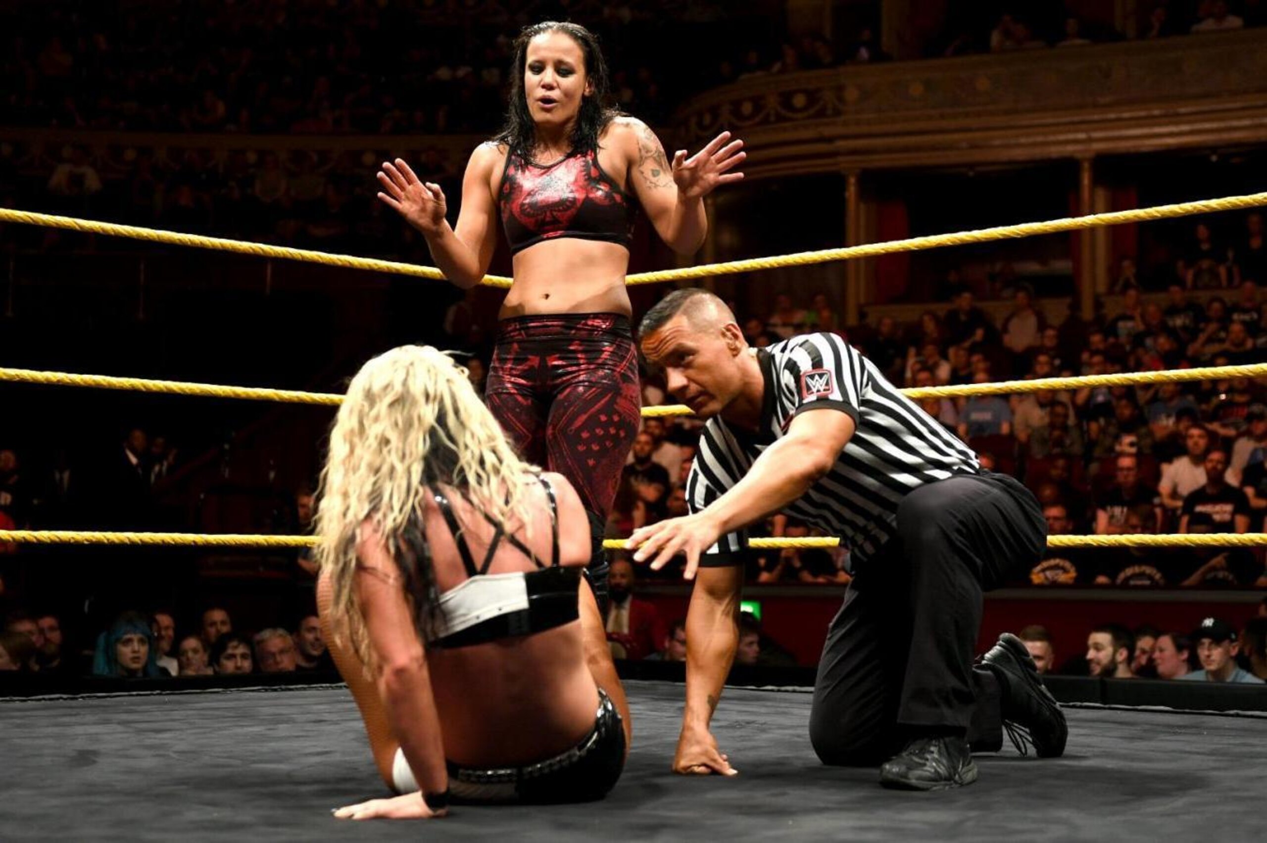 Shayna Baszler looks unimpressed by Toni Storm.