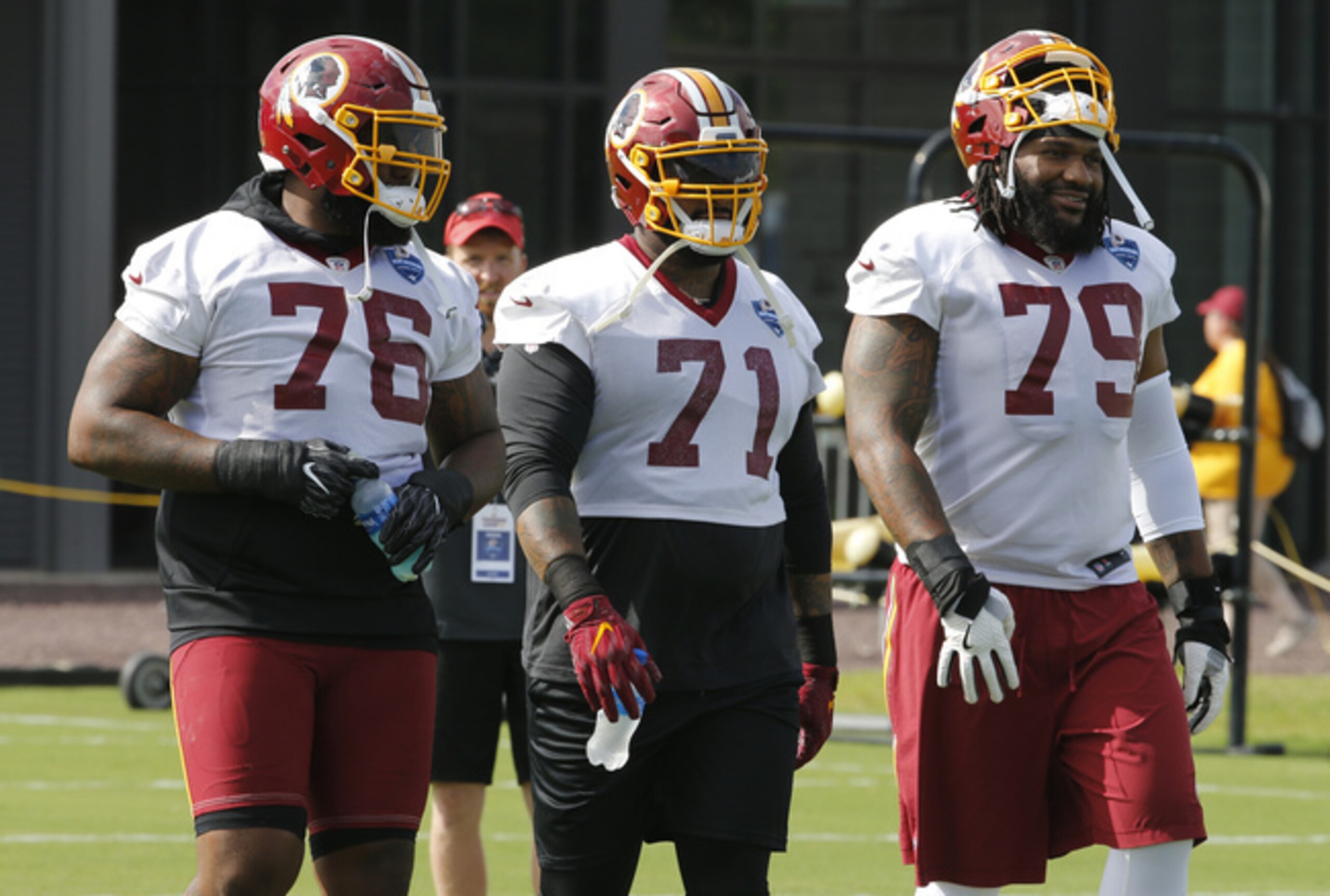 Morgan Moses (76) and Trent Williams (71)