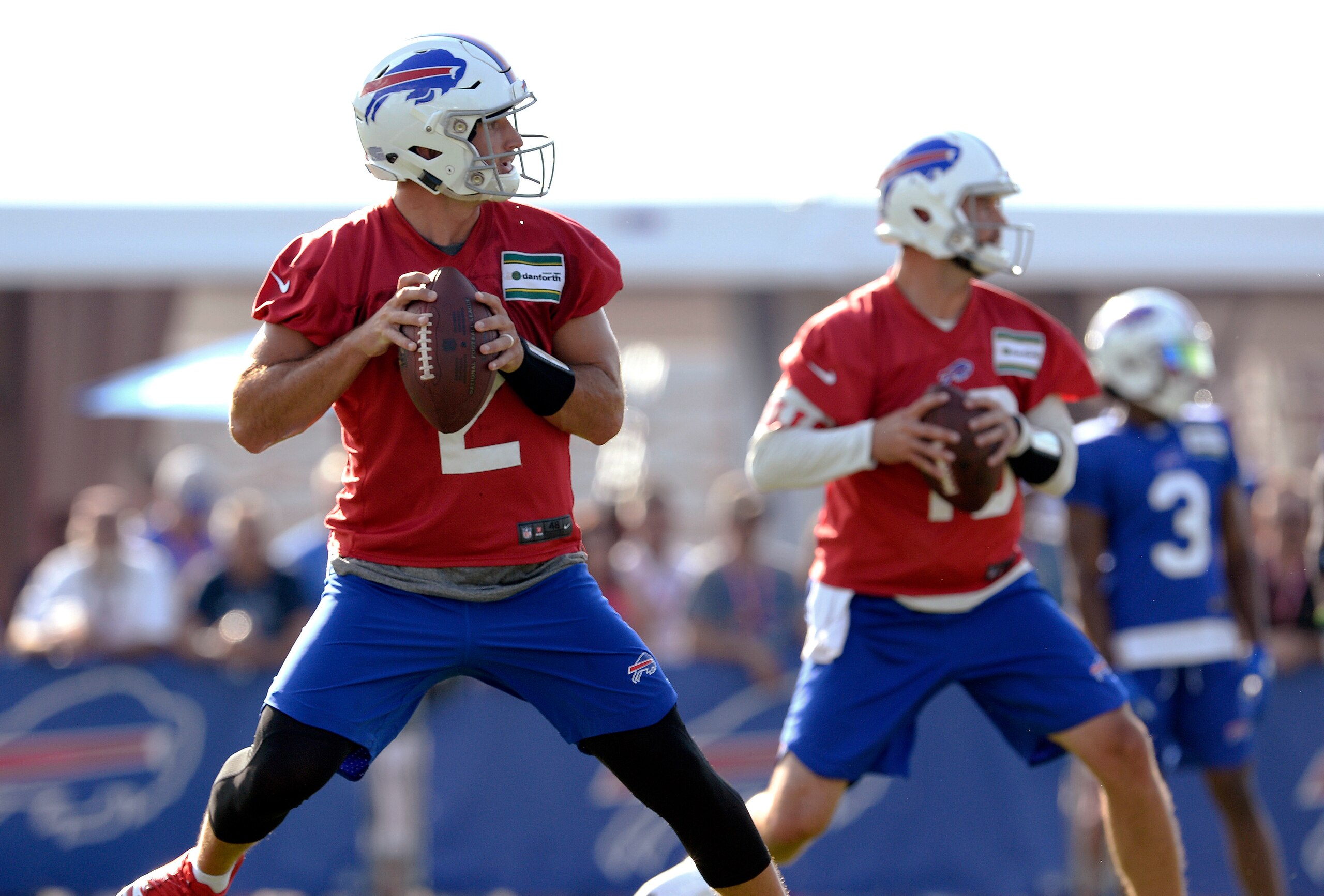 Buffalo Bills quarterbacks Nathan Peterman (left) and AJ McCarron (right)