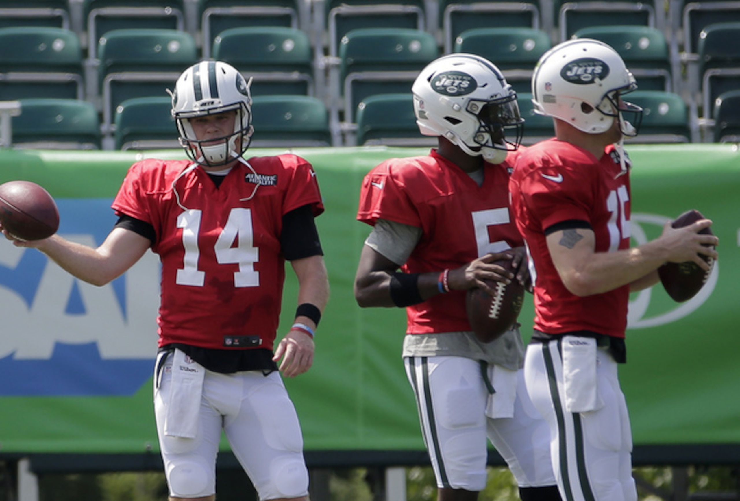 New York Jets quarterbacks Sam Darnold (14), Teddy Bridgewater (5) and Josh McCown (15)