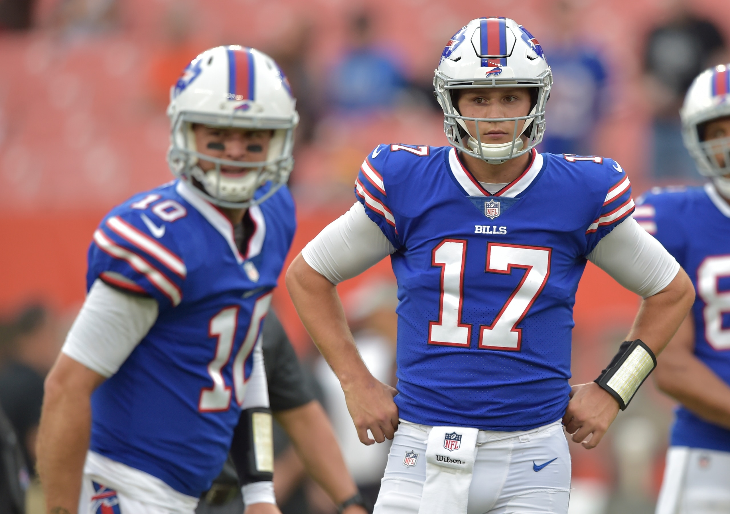 Buffalo Bills quarterbacks AJ McCarron (left) and Josh Allen (right)